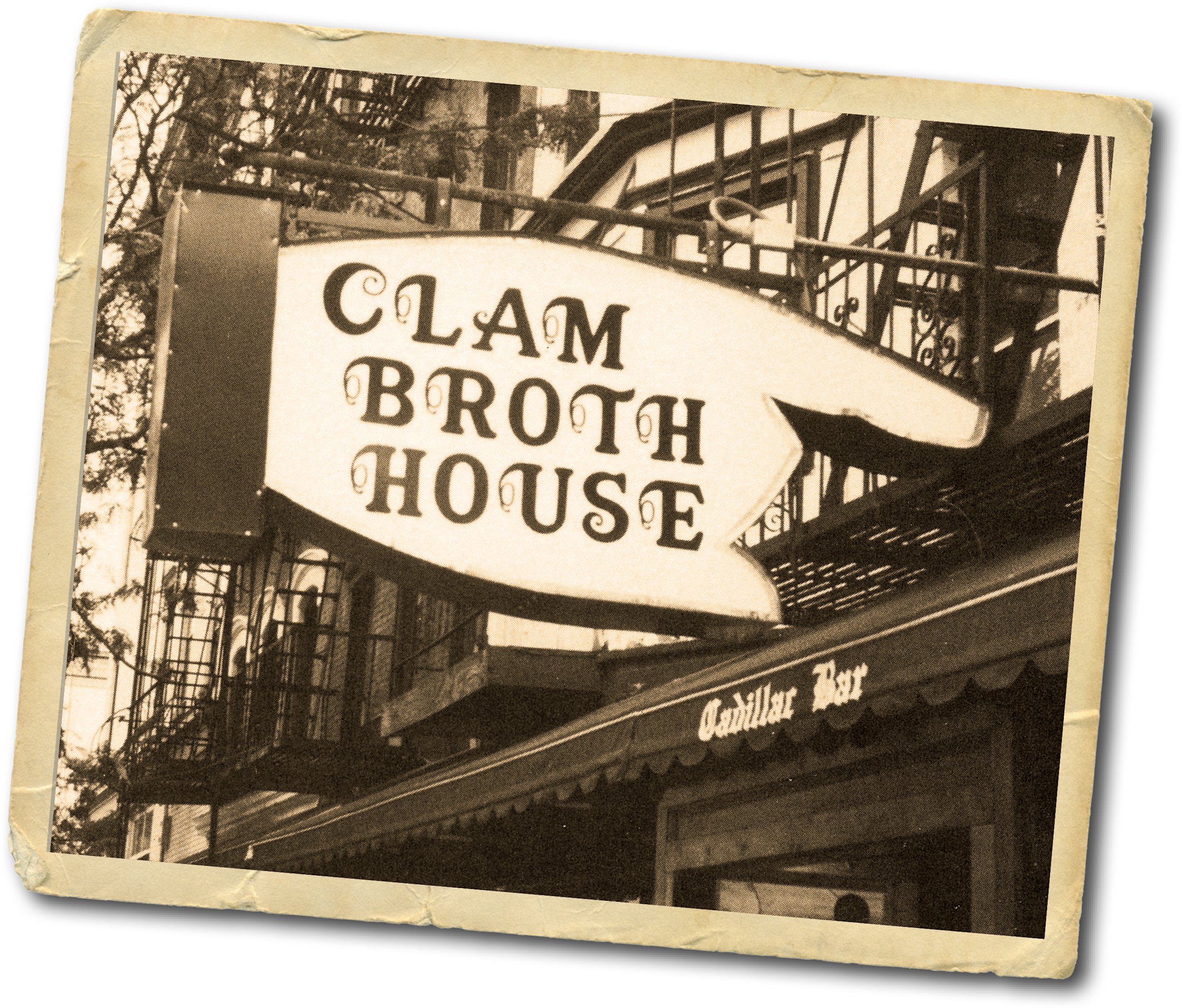 Clam Broth House restaurant, with a finger-shaped sign that reads “Clam Broth House.” 
