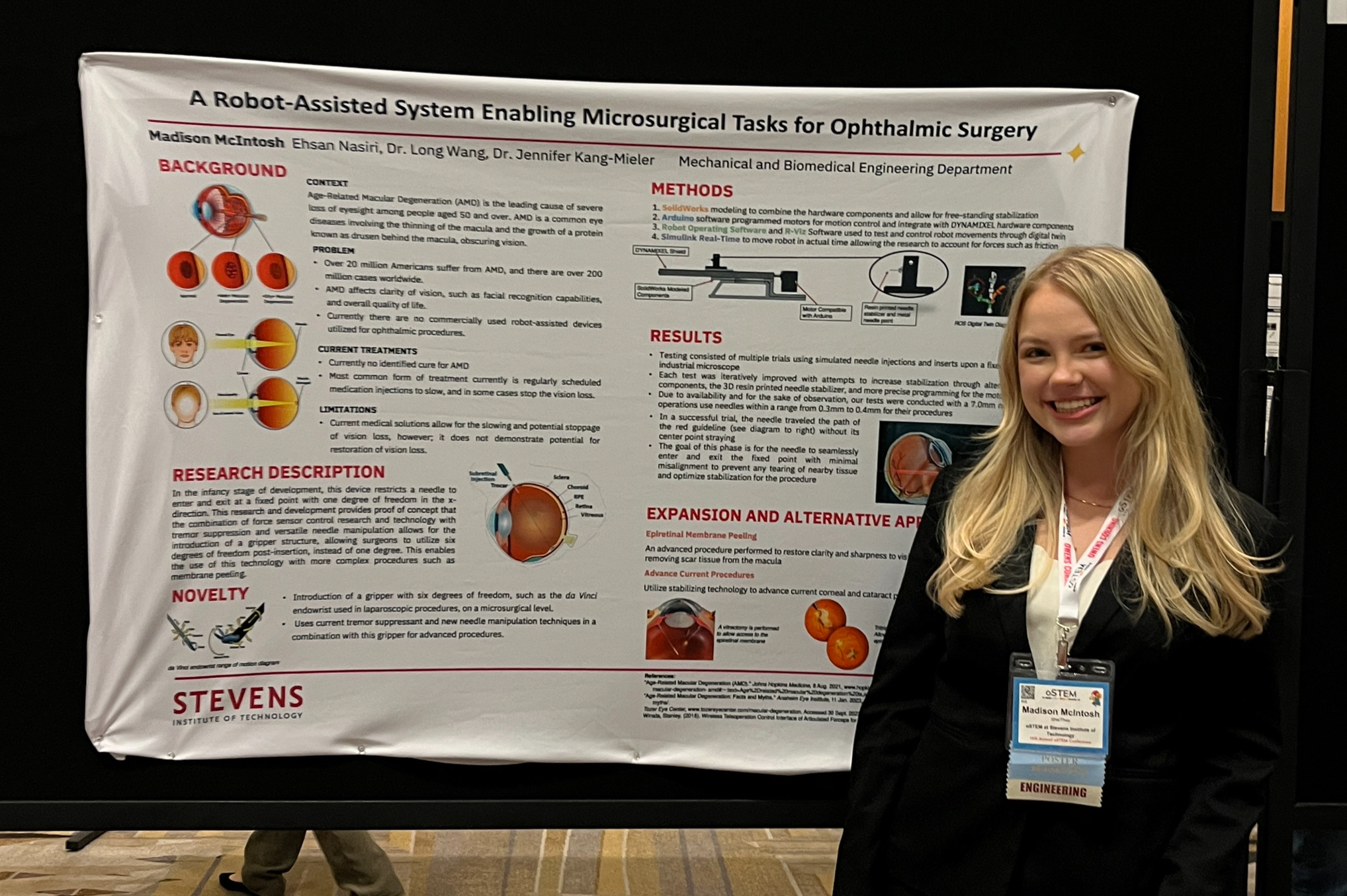 Photo of student Madison McIntosh ’25 standing in front of her poster presentation