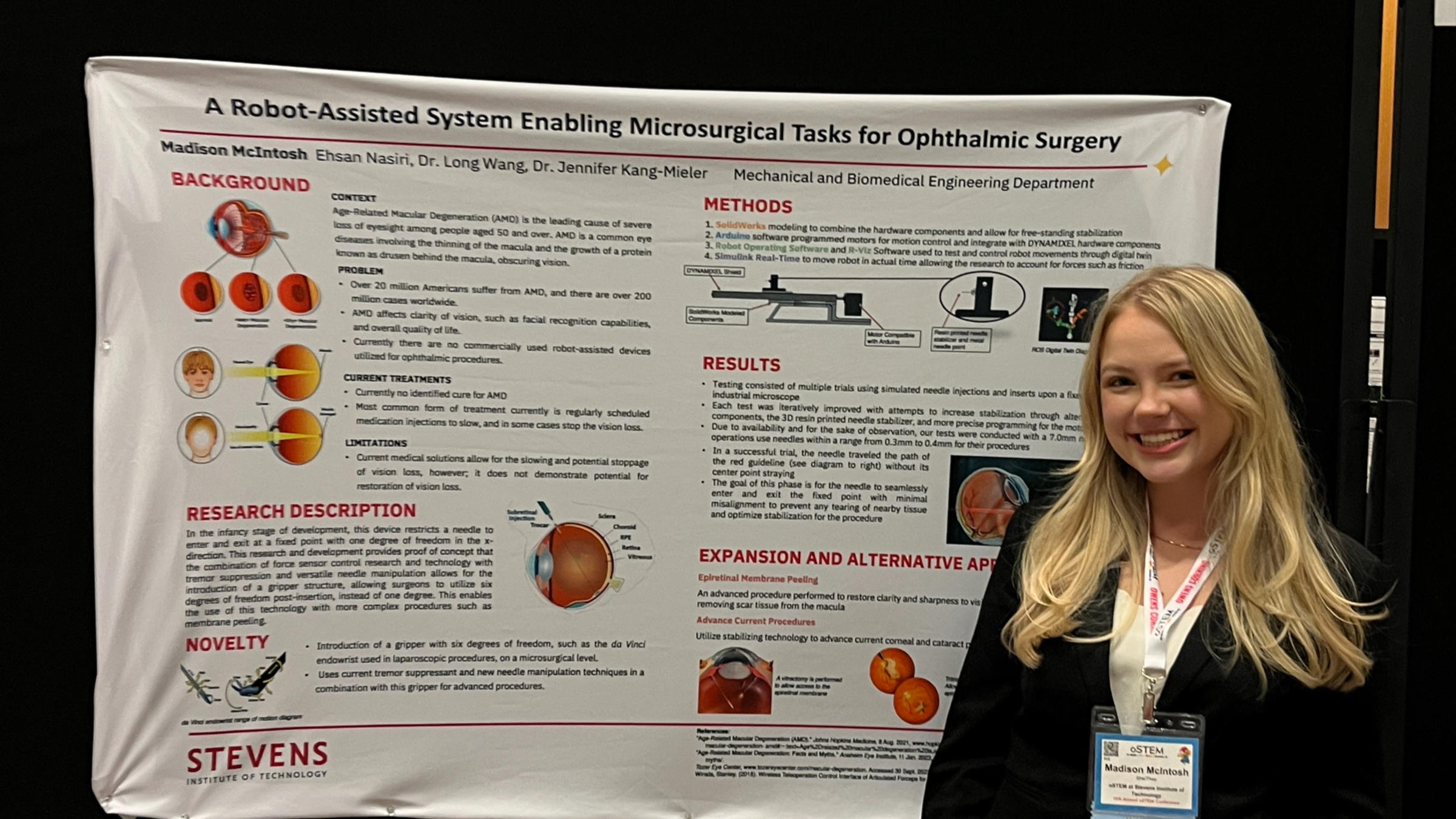 Photo of student Madison McIntosh ’25 standing in front of her poster presentation