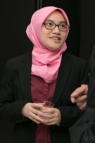A student at the Beta Gamma Sigma event.