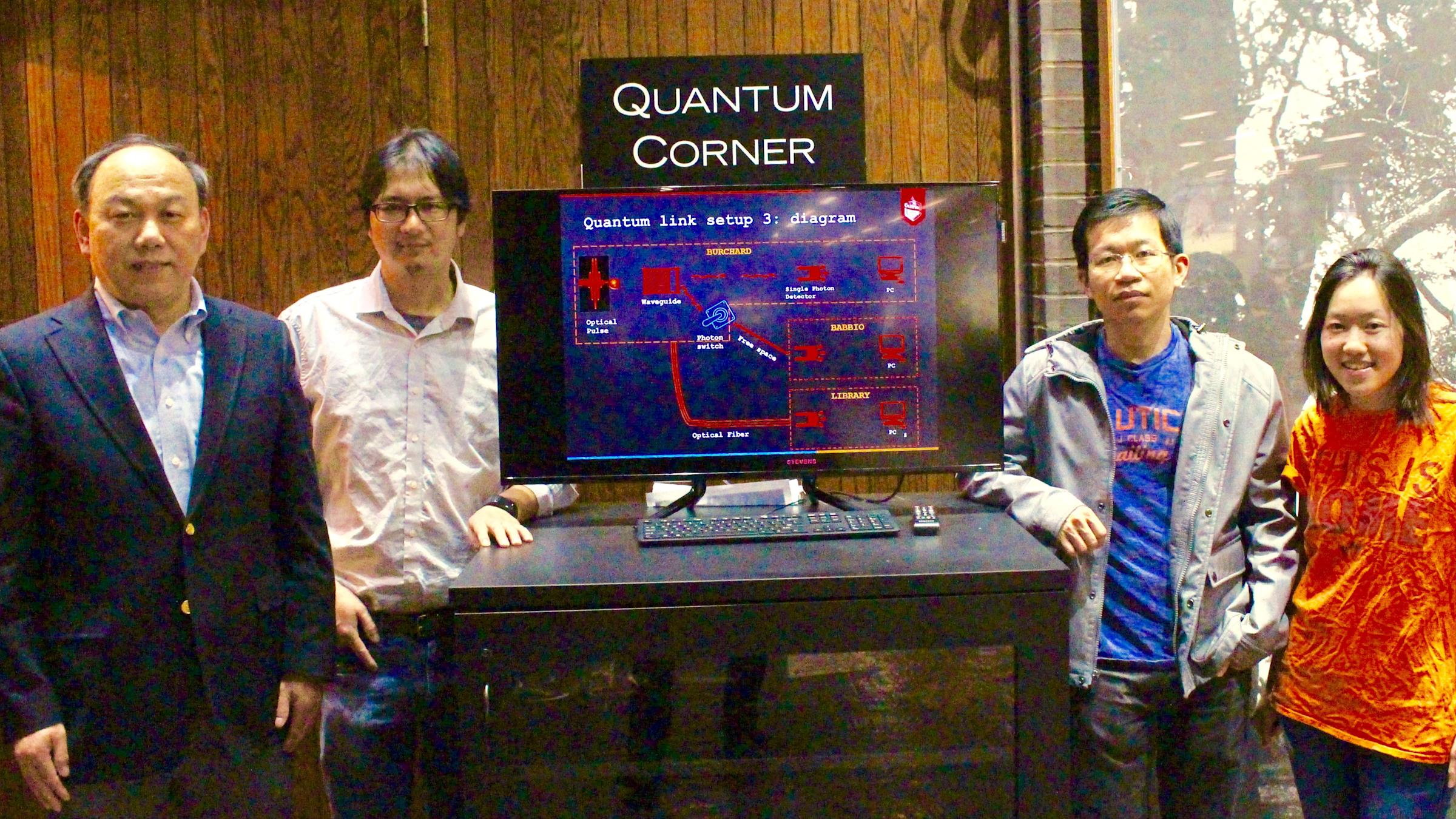 Physics faculty and students in the Stevens library