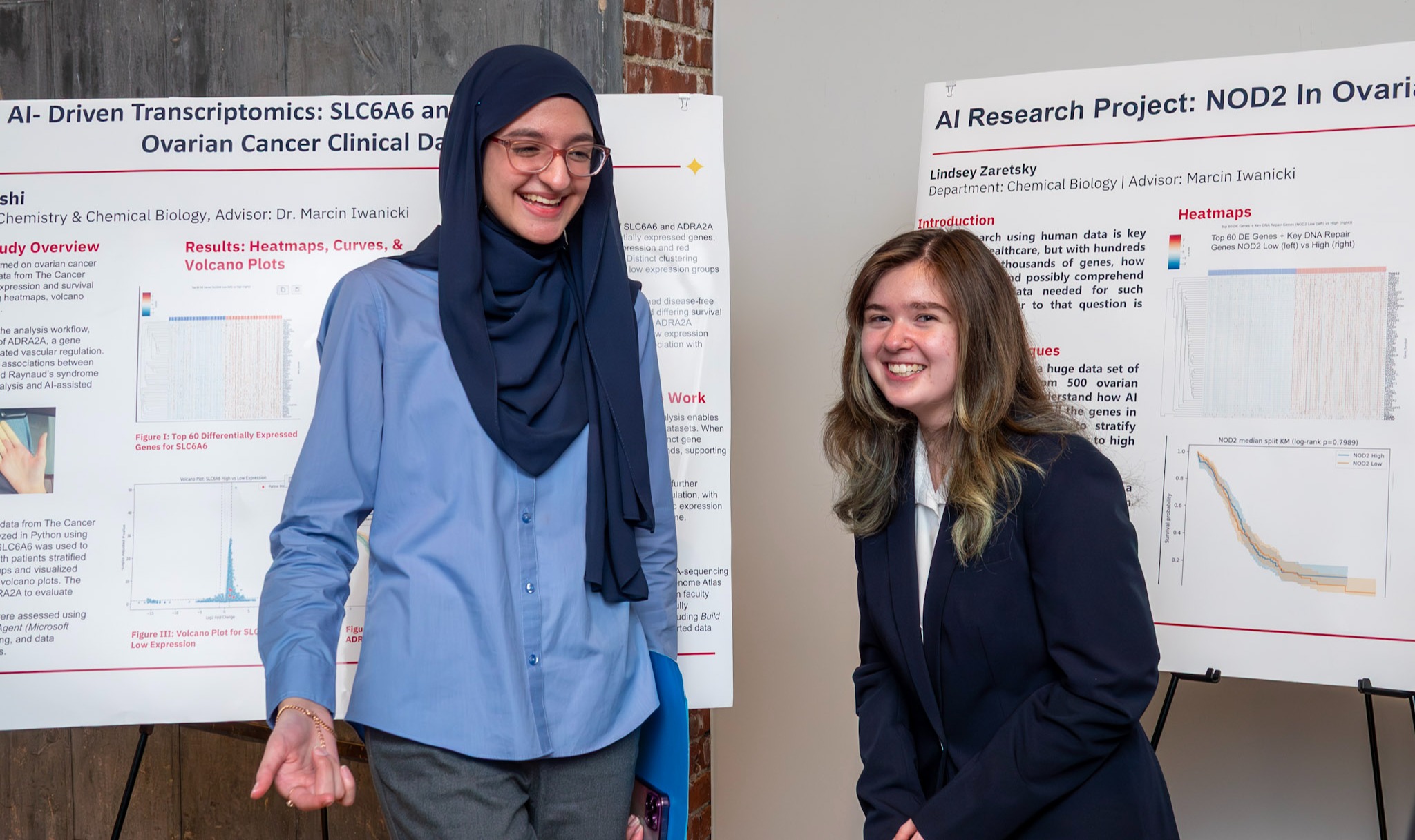 Two students wearing personal protective gear working in the newly renovated chemical biology laboratory..