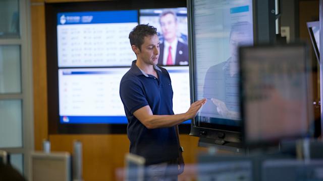 professor touching screen at Hanlon Lab
