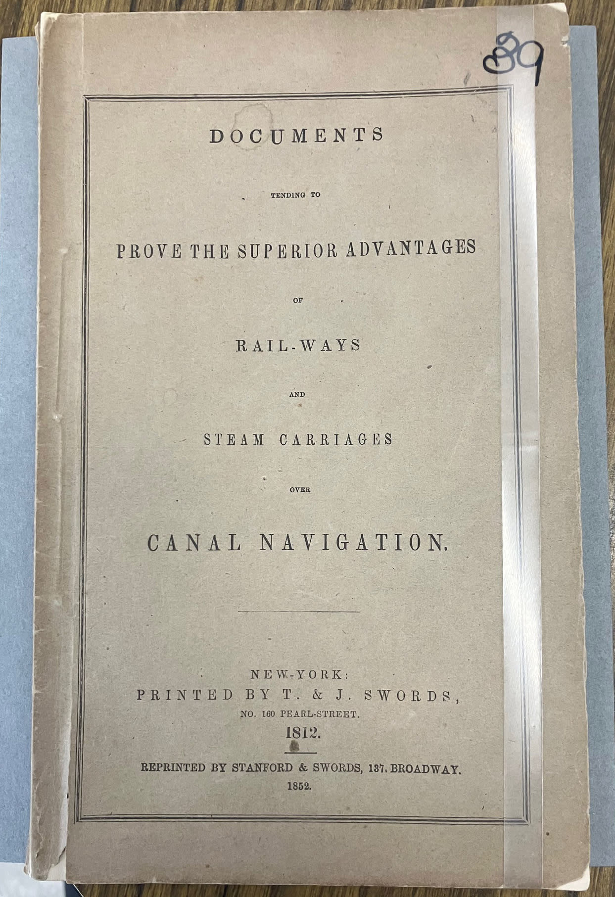 1812 book with the title "Documents Tending to Prove The Superior Advantages of Rail-Ways and Steam-Carriages Over Canal Navigation".