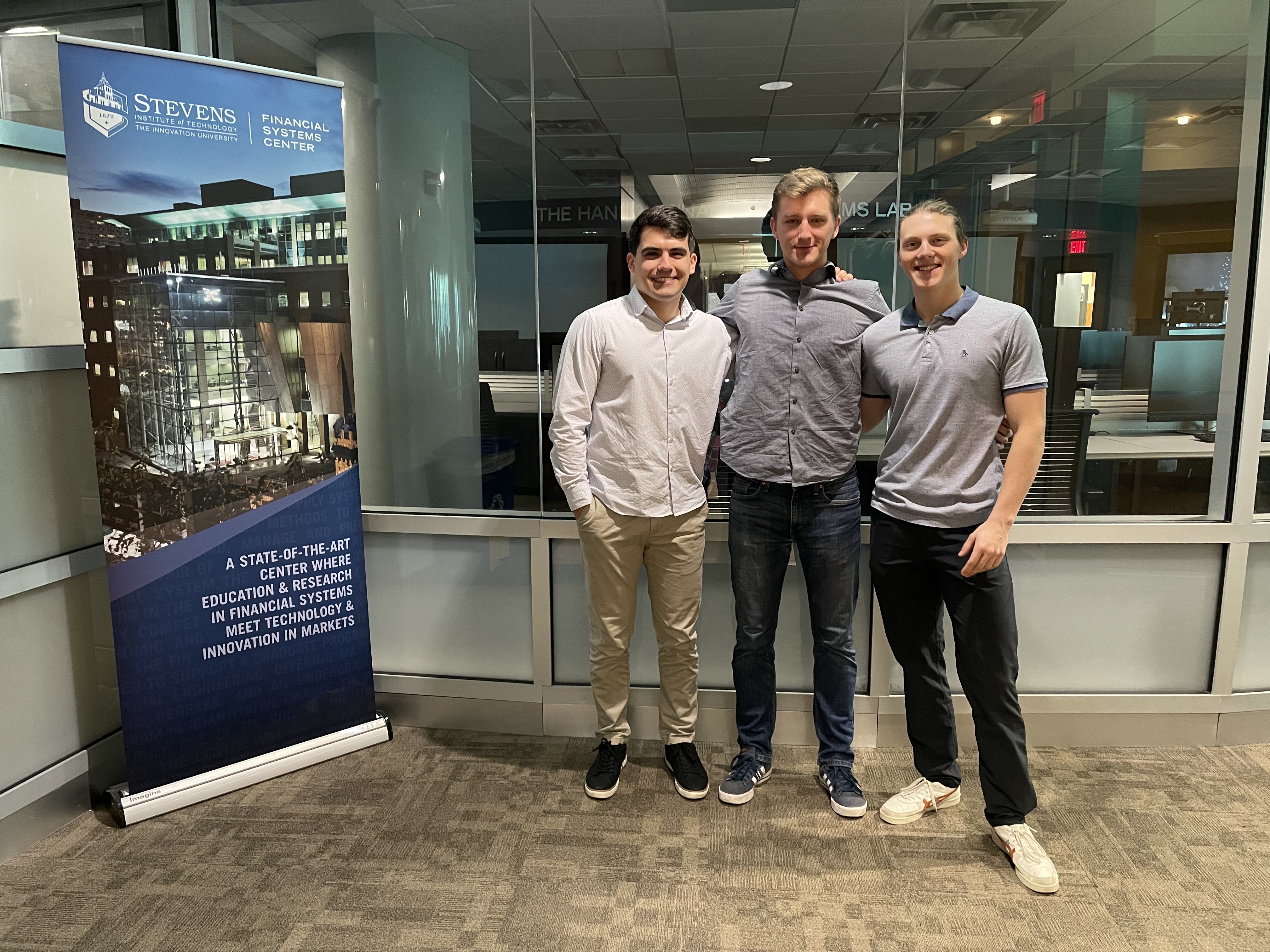 Lech, Stepanyan, and Moszczynski outside the Hanlon Financial Systems Center