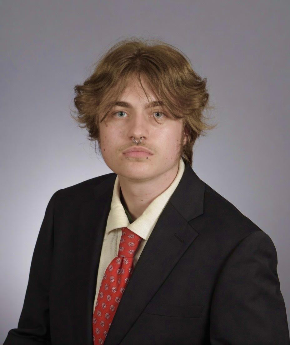 Professional headshot of Max Nydam