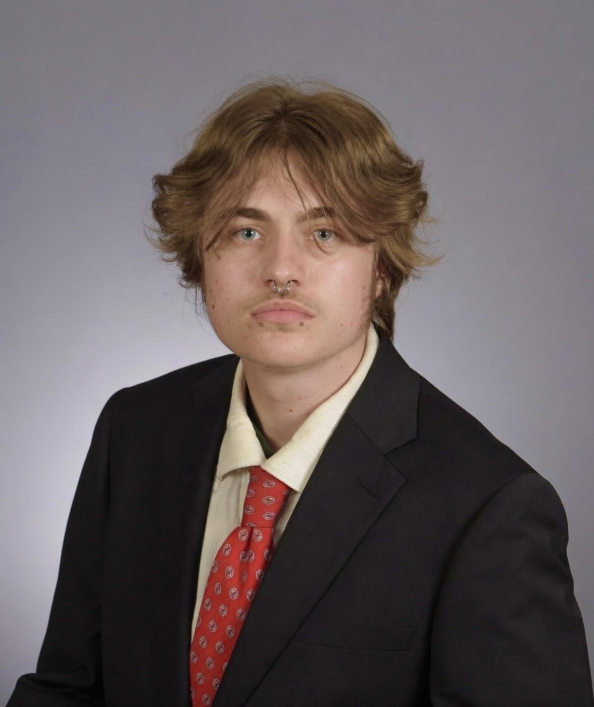 Professional headshot of Max Nydam