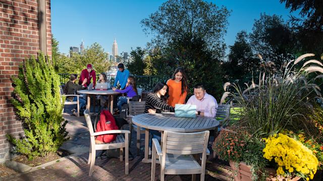 Image of Students on Campus on Laptops