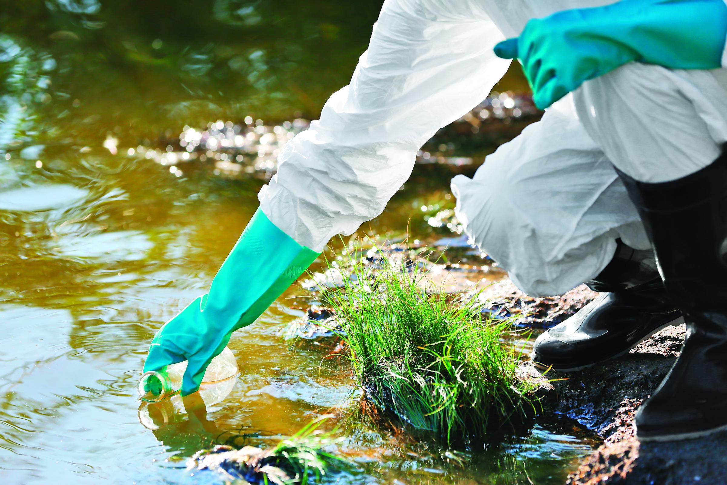 environmental scientist testing water samples