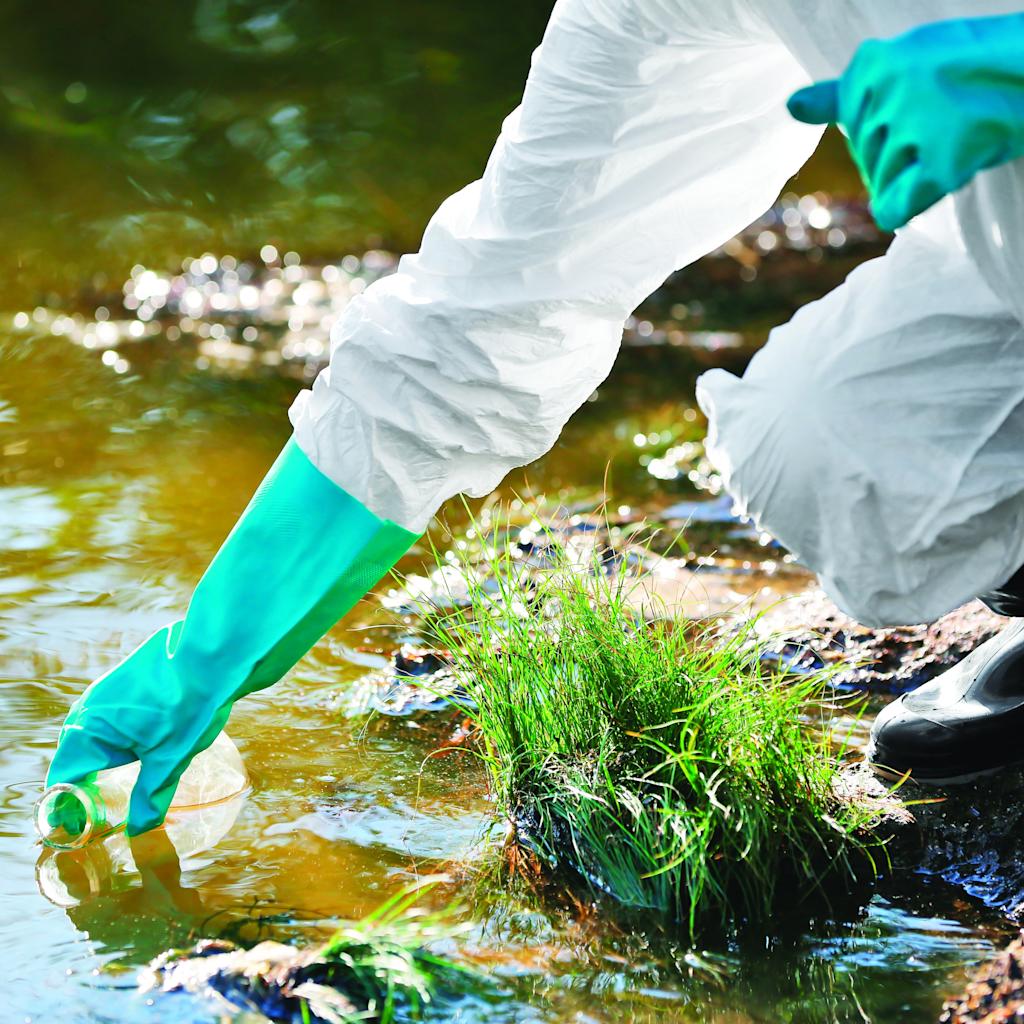 environmental scientist testing water samples.