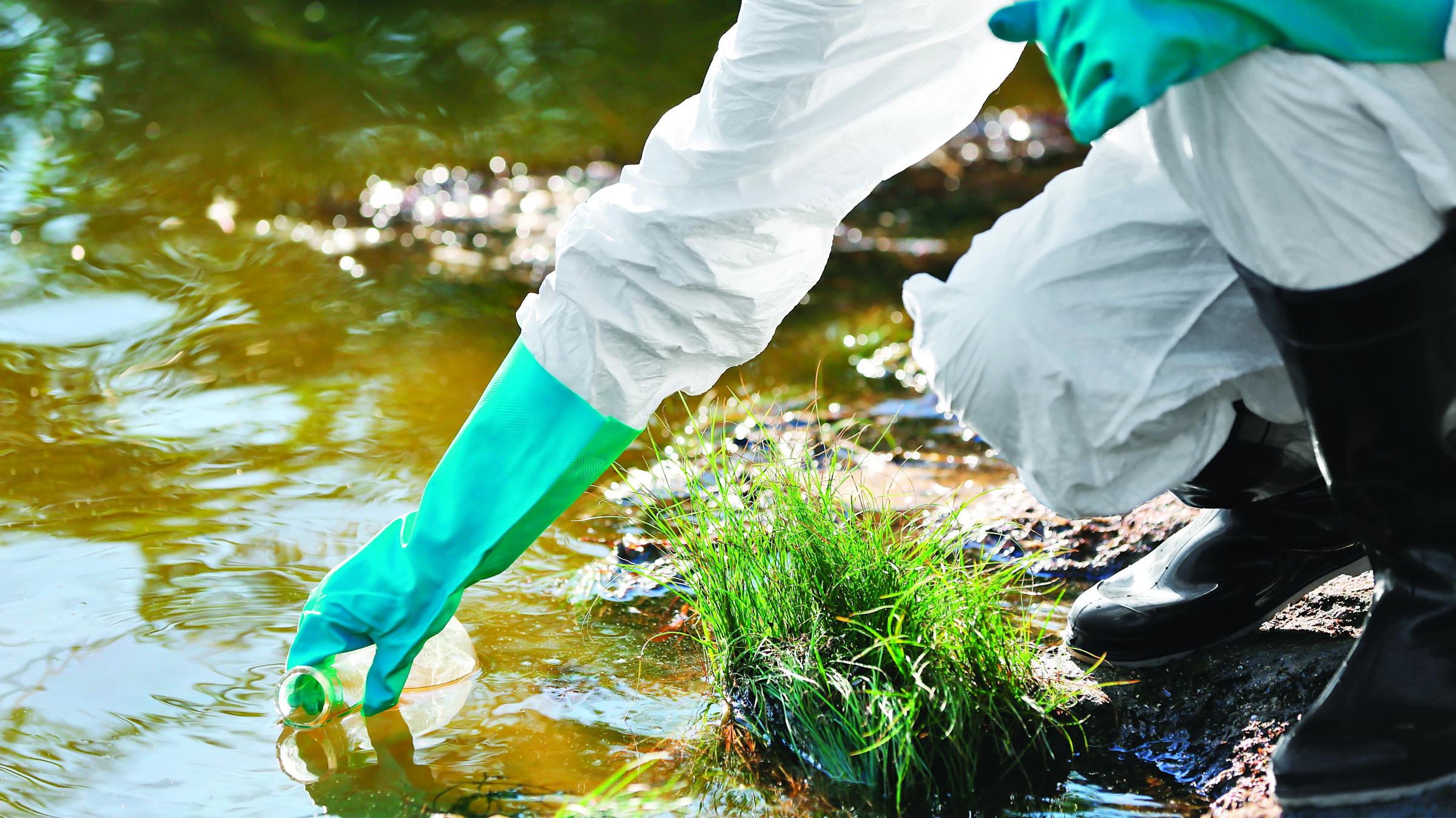 environmental scientist testing water samples.