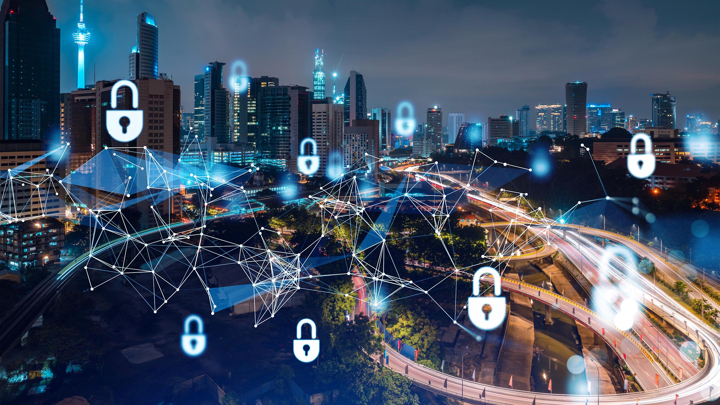 City skyline at night with a matrix web and lock icons superimposed on top.