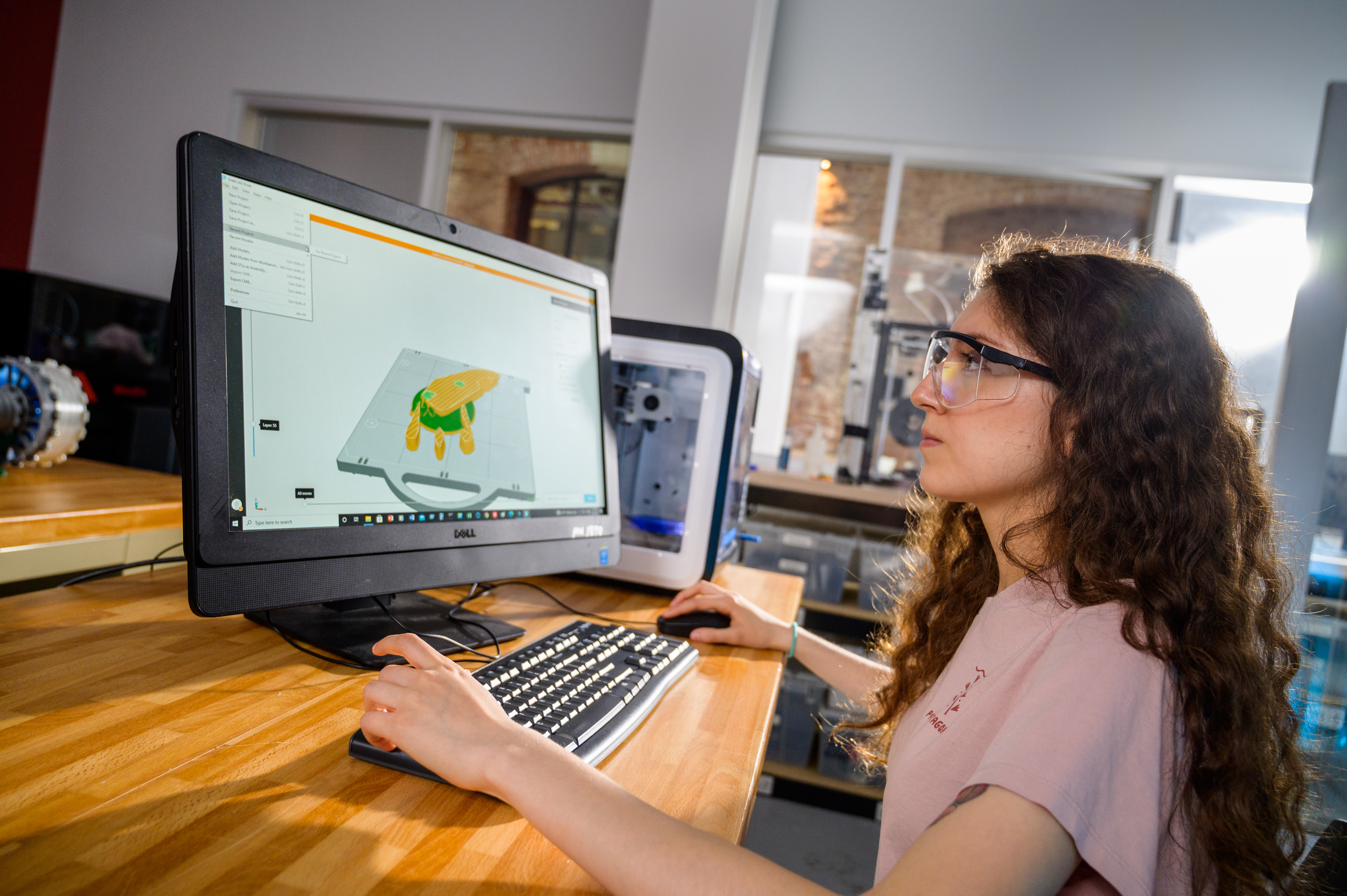 student in lab working on the computer