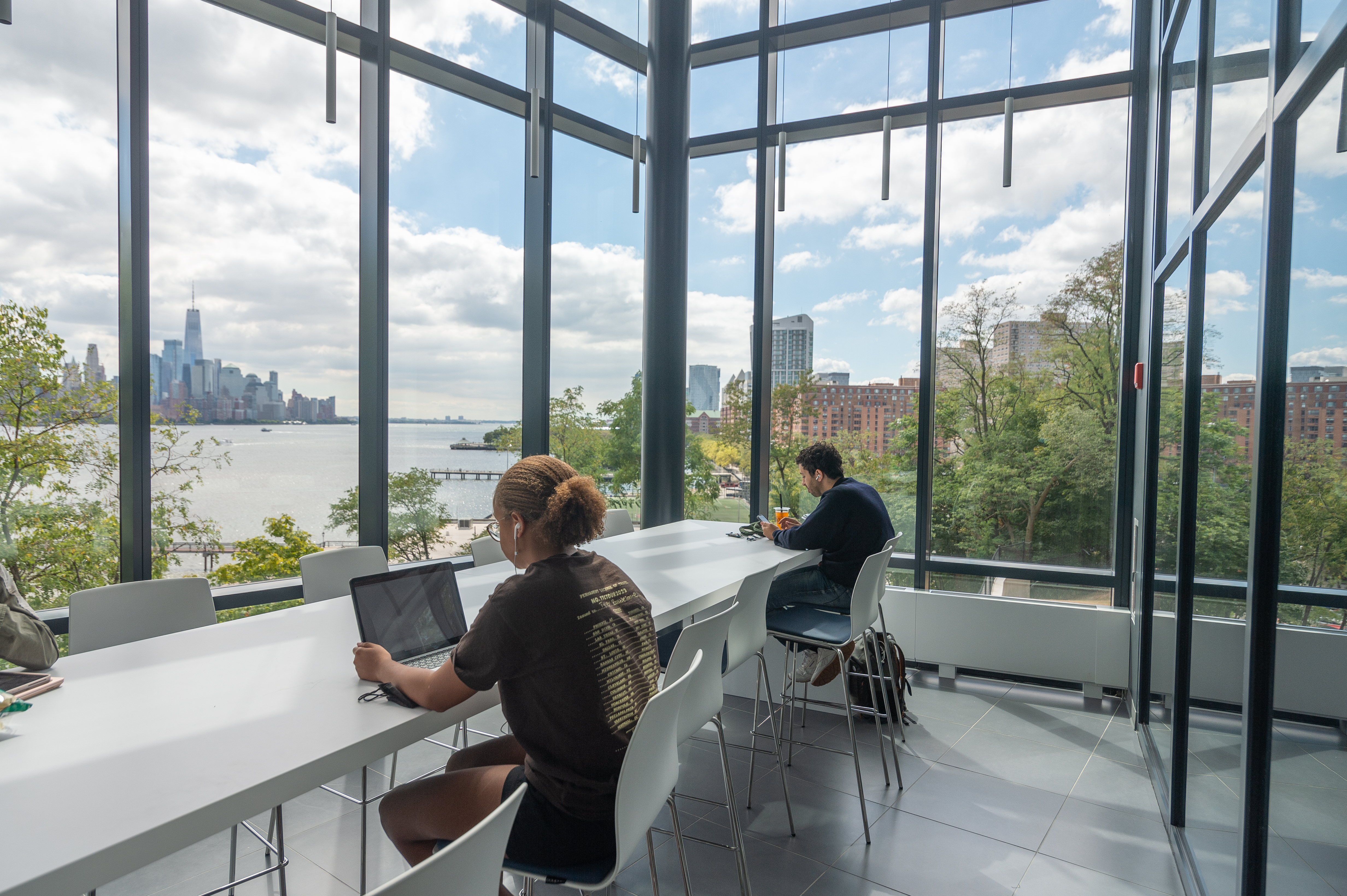 Students working in an open atrium