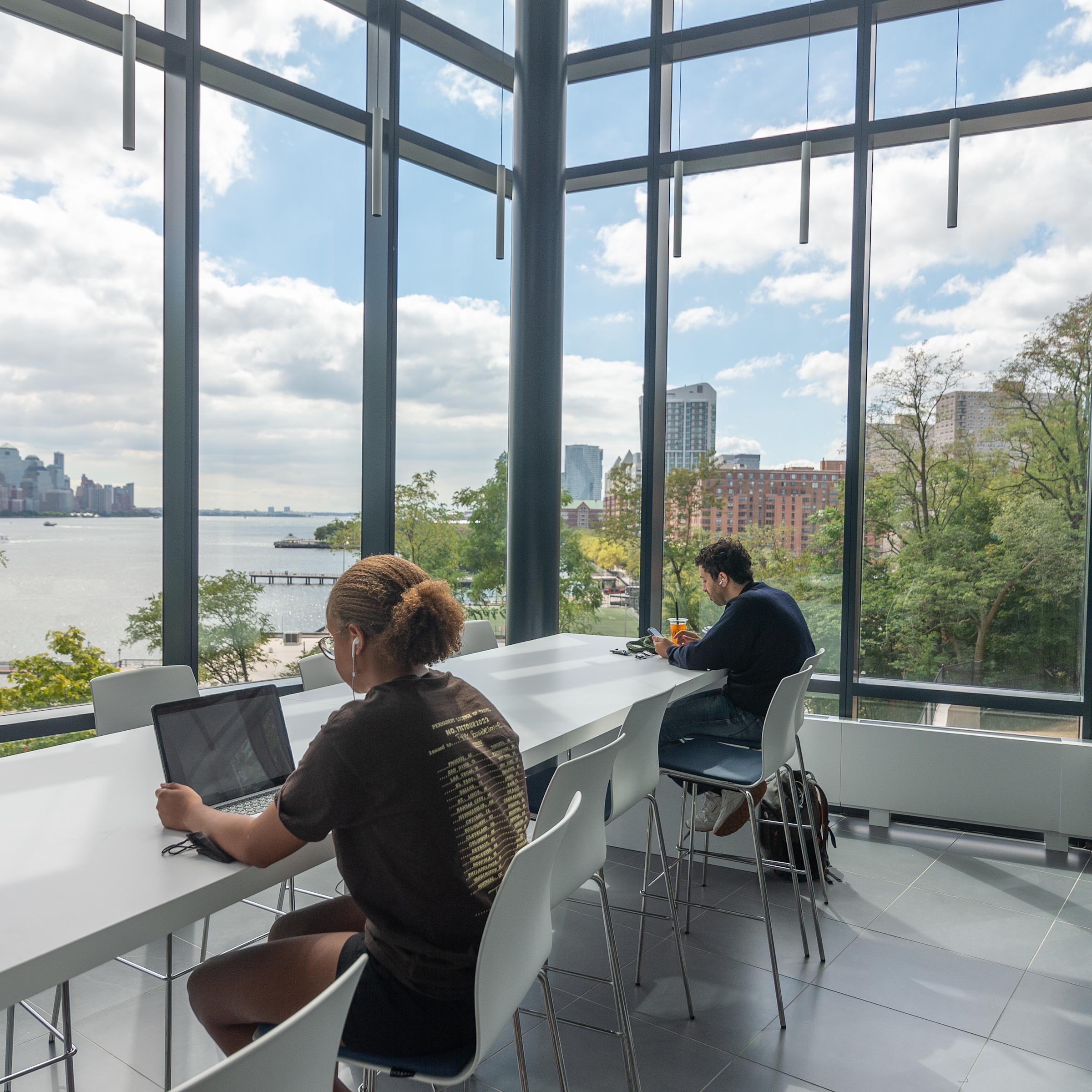 Students working in an open atrium