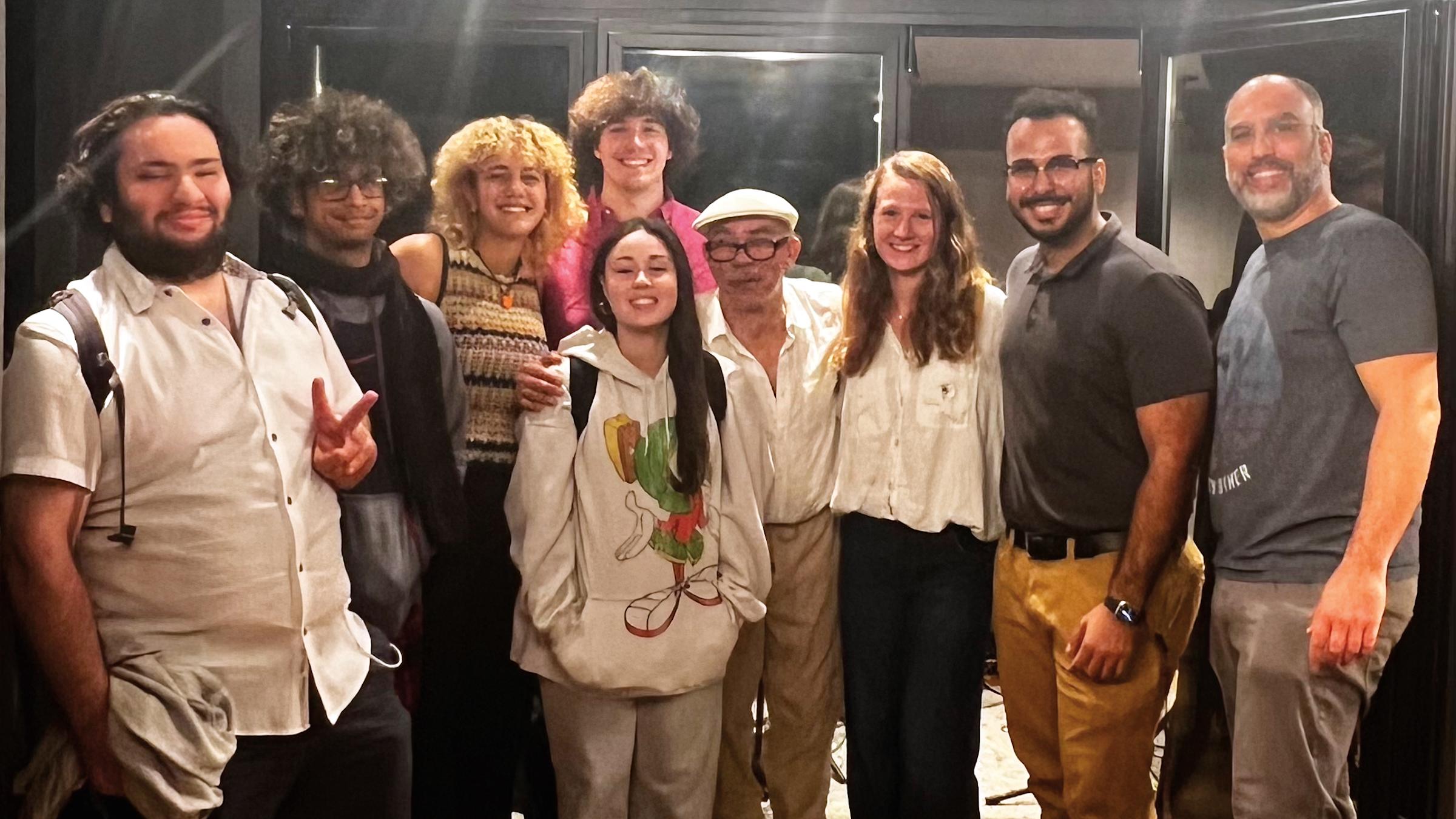 Afro-Latin jazz musician Abraham Rodriguez Jr., center, with Stevens students, from left, Teddy Diamond, Ashton Hummler, Sophia Zahran, Conlan Hurley, Valentina Vasquez, Anna Smith, Aidan Munoz, prof Michael Flannery, at Second Take Sound studio in NYC.