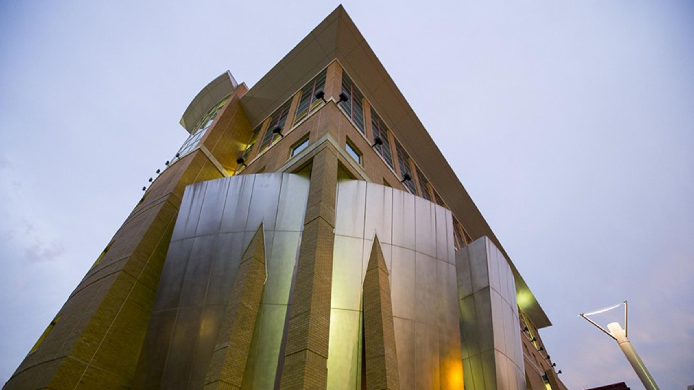 The Babbio Center, on the Stevens campus, looking up at twilight.