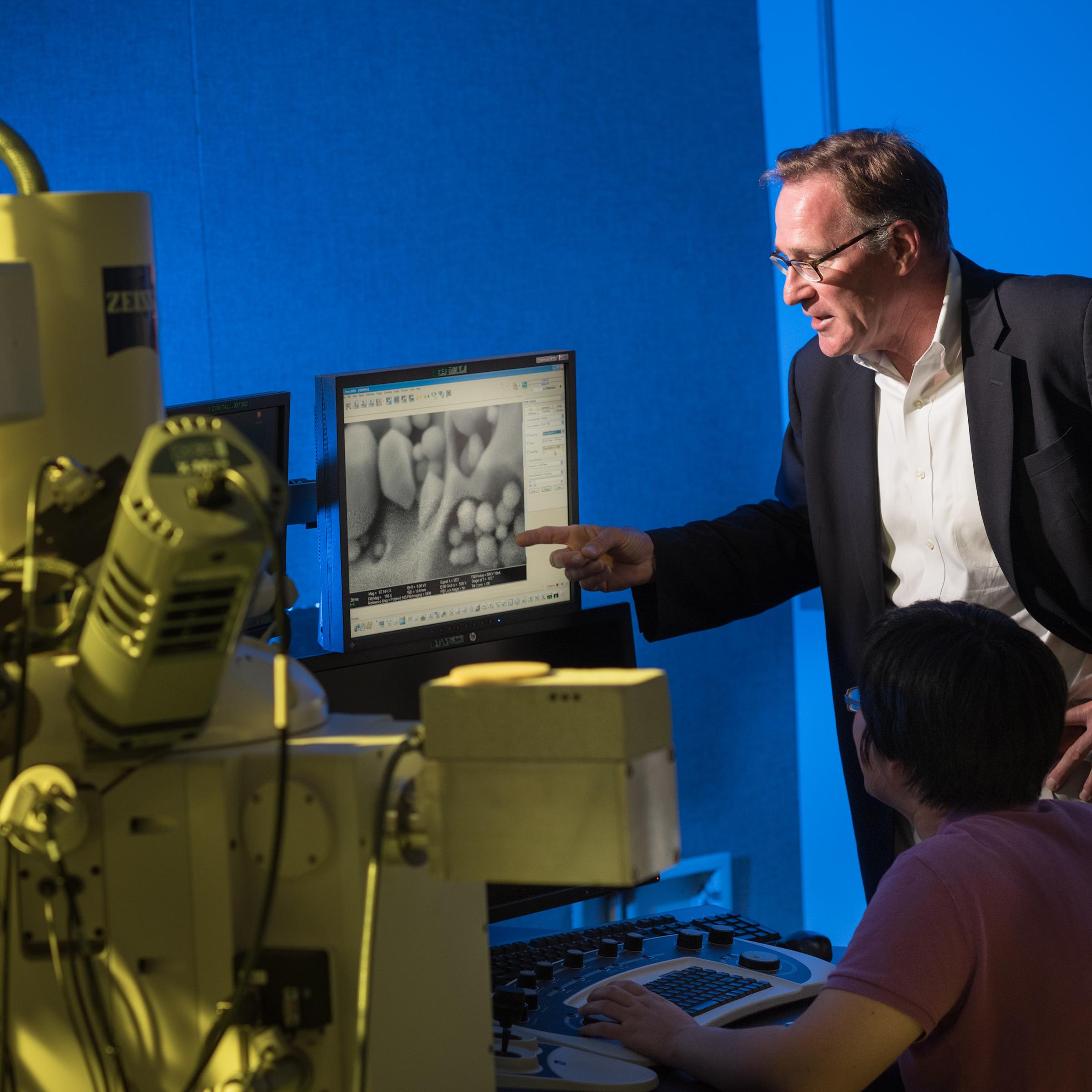 Professor Matt Libera and student in the lab
