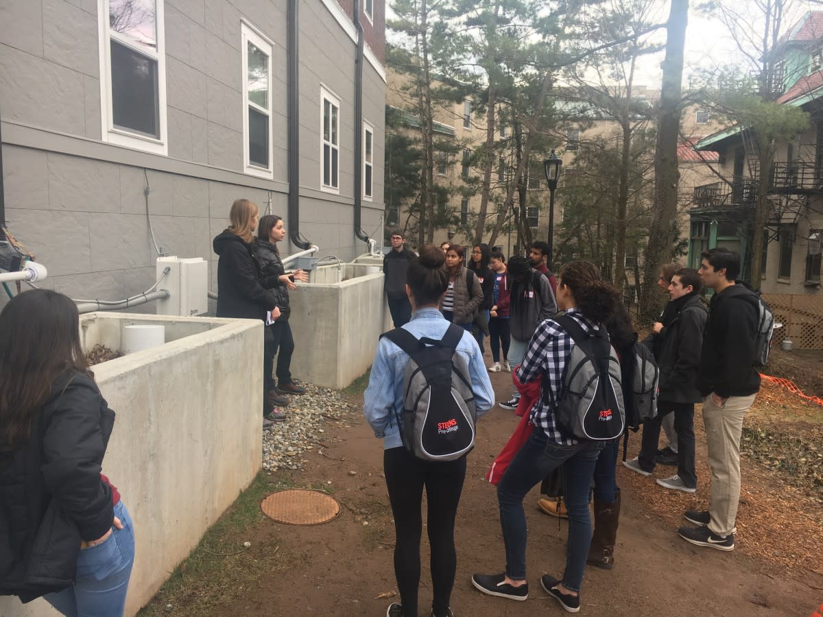Peer education--Stevens civil engineering student Maryia Spirydonava explains bioretention planters to visiting high school students sometime last winter