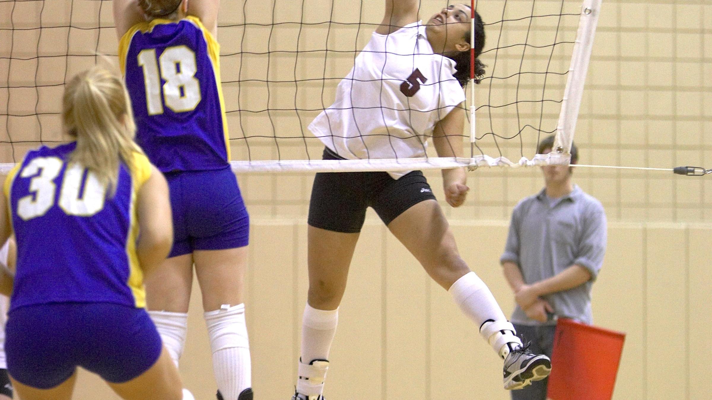 Students playing volleyball