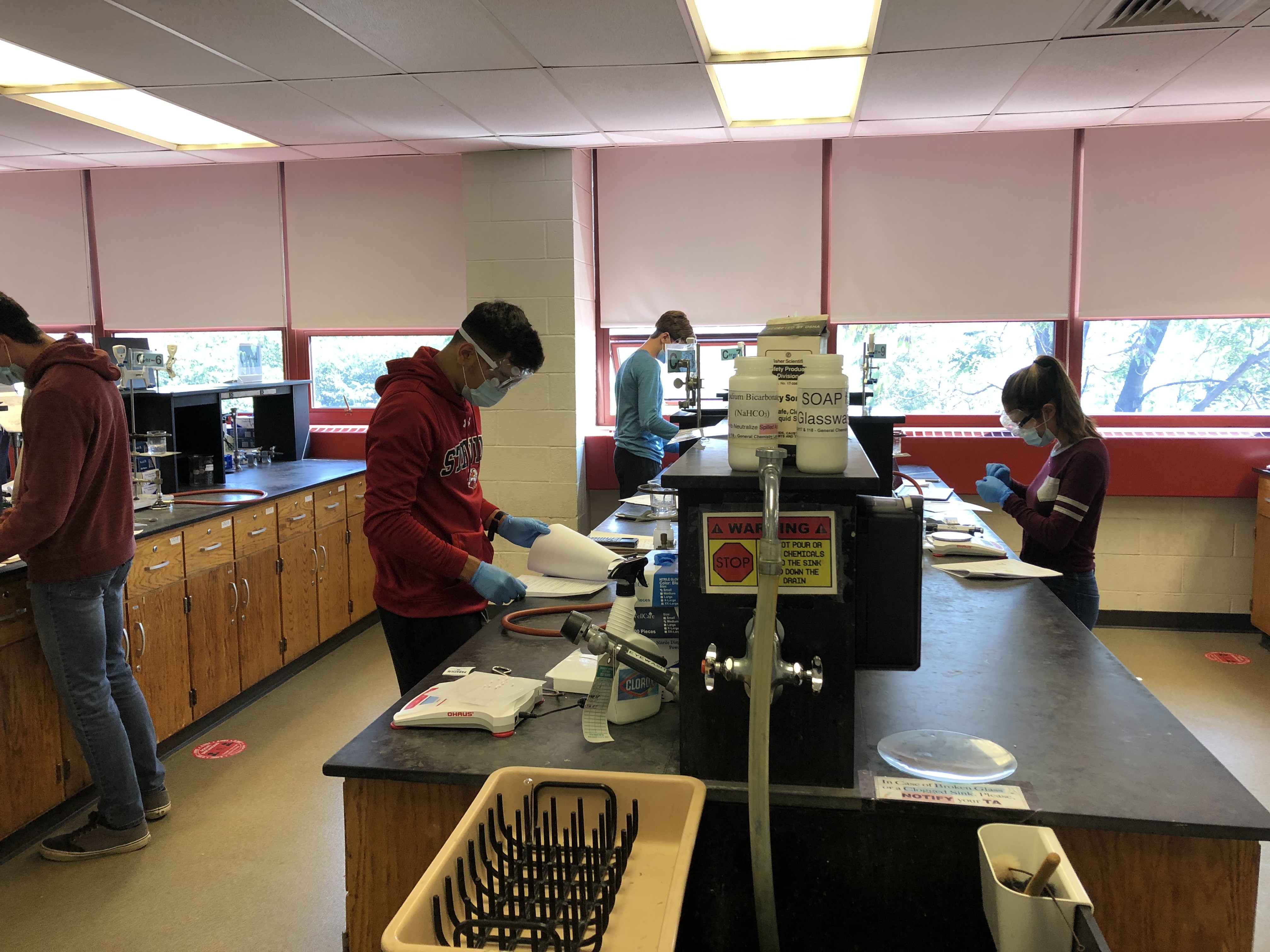 photo of students wearing PPE in the lab