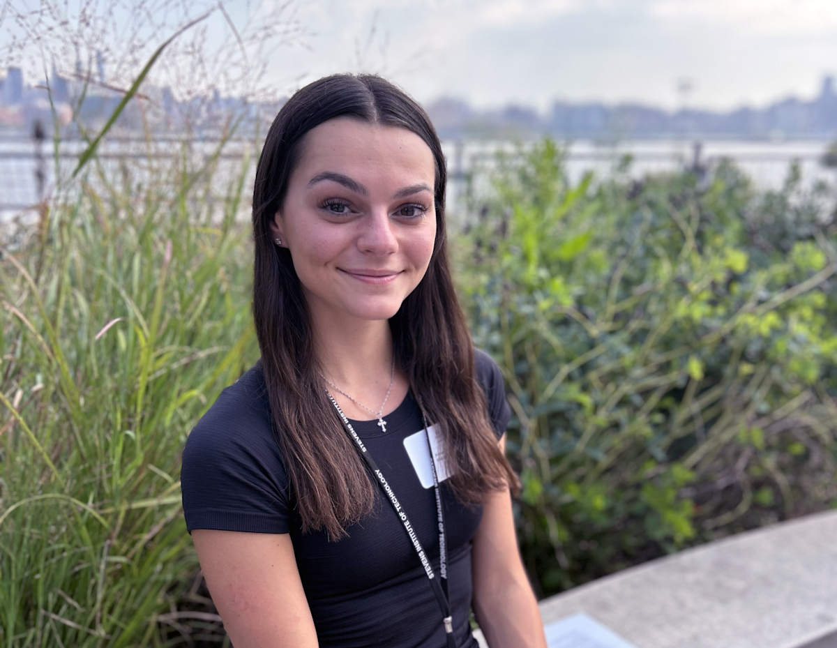 Anna Zielonka sits on the Babbio Center patio.