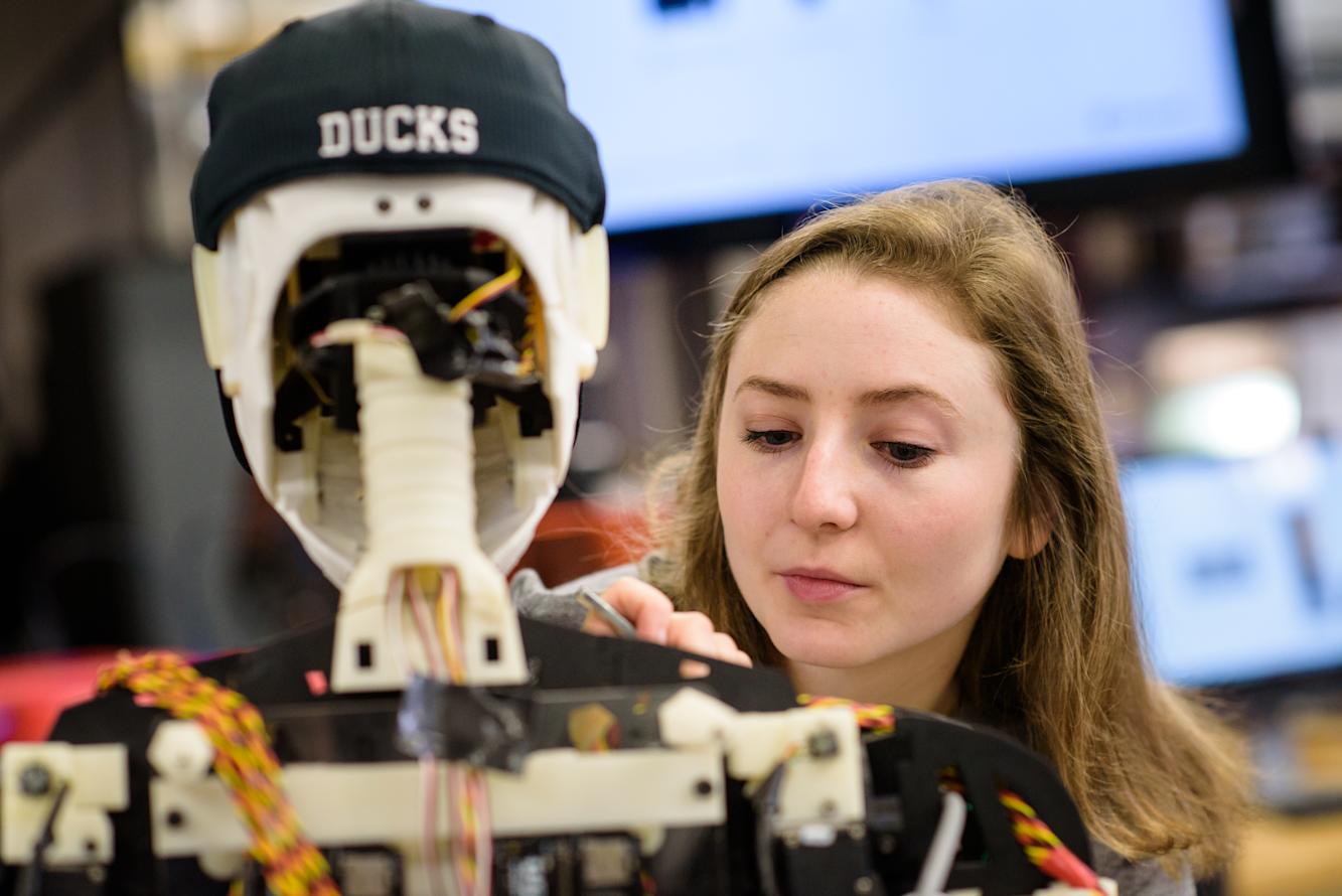 A student working on a robot 