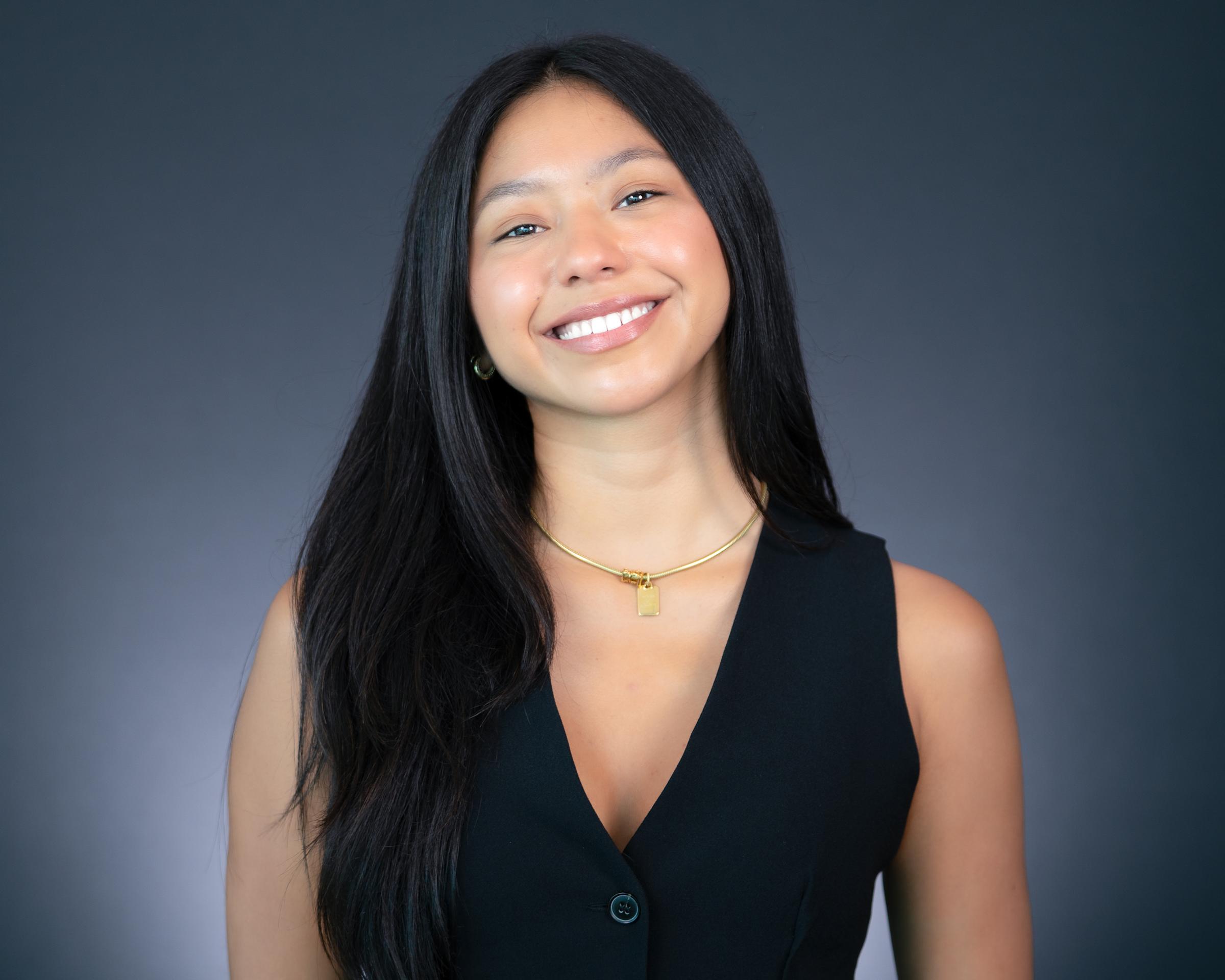 Headshot of Emma Eguia wearing professional attire.