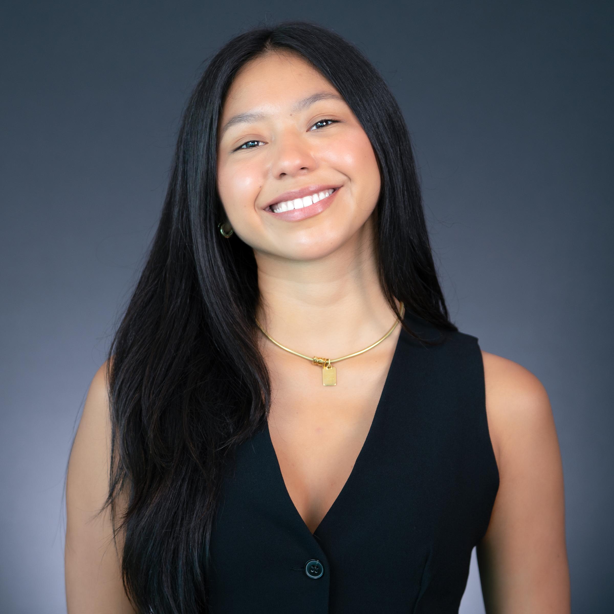 Headshot of Emma Eguia wearing professional attire.