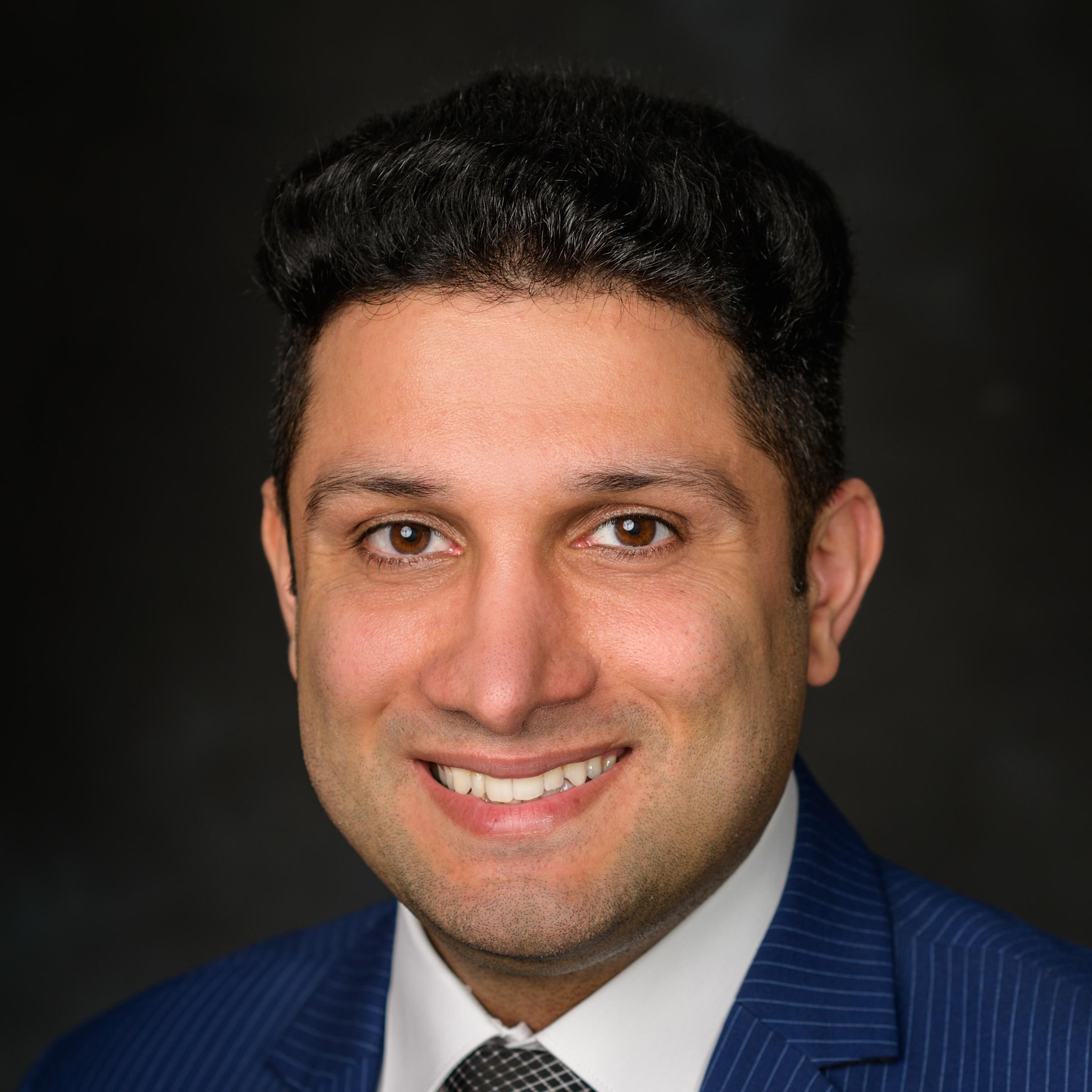 A headshot of Hadi Safari Katesar