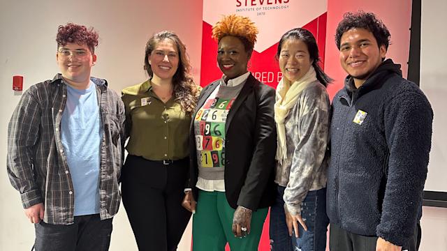 Stevens Director of Diversity, Equity and Inclusion Liliana Delman and keynote speaker Aisha Lawrey '99 pose with students