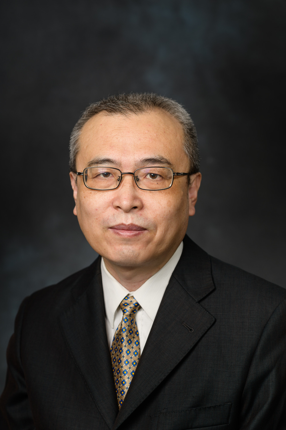 A portrait of Xiaojun Yu