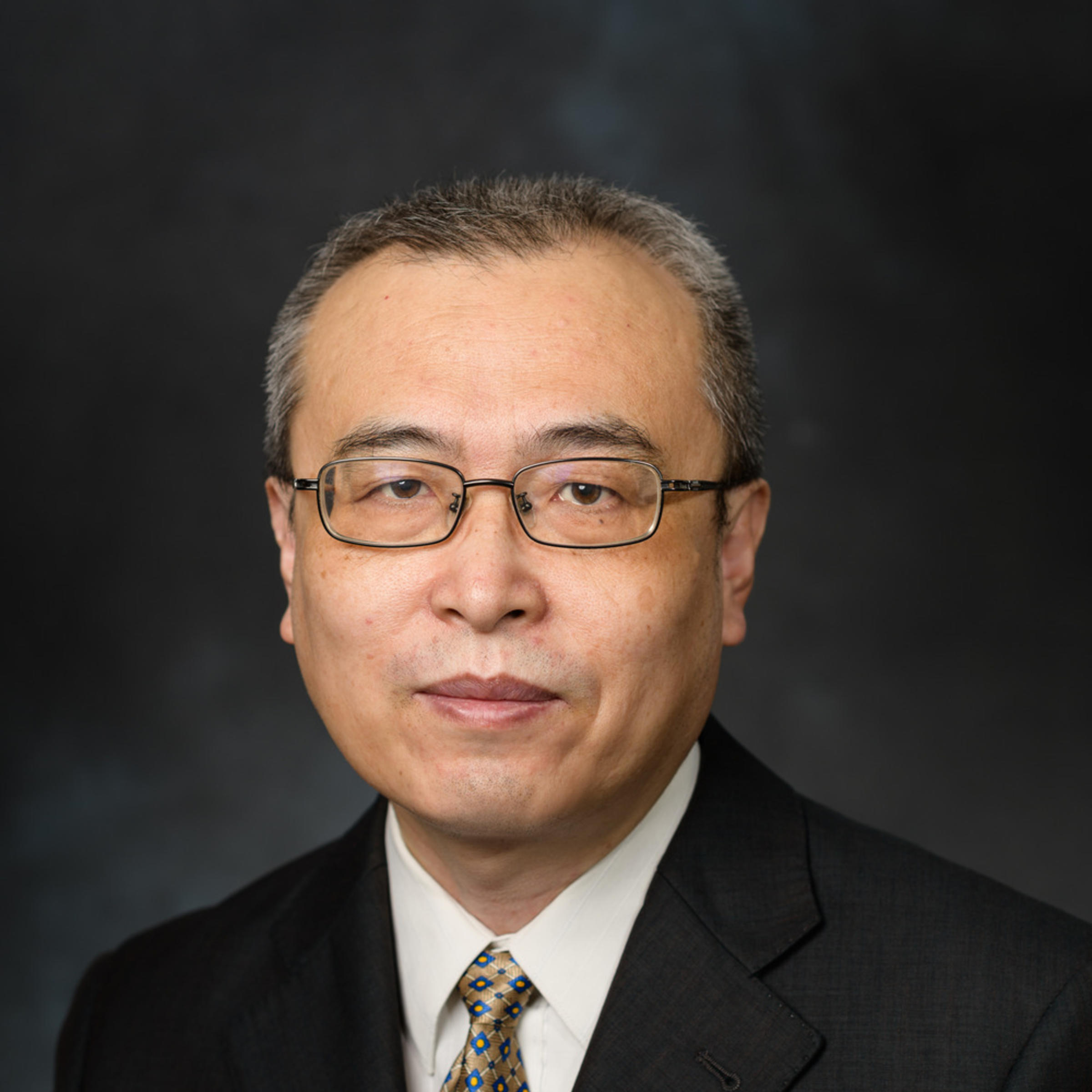 A portrait of Xiaojun Yu