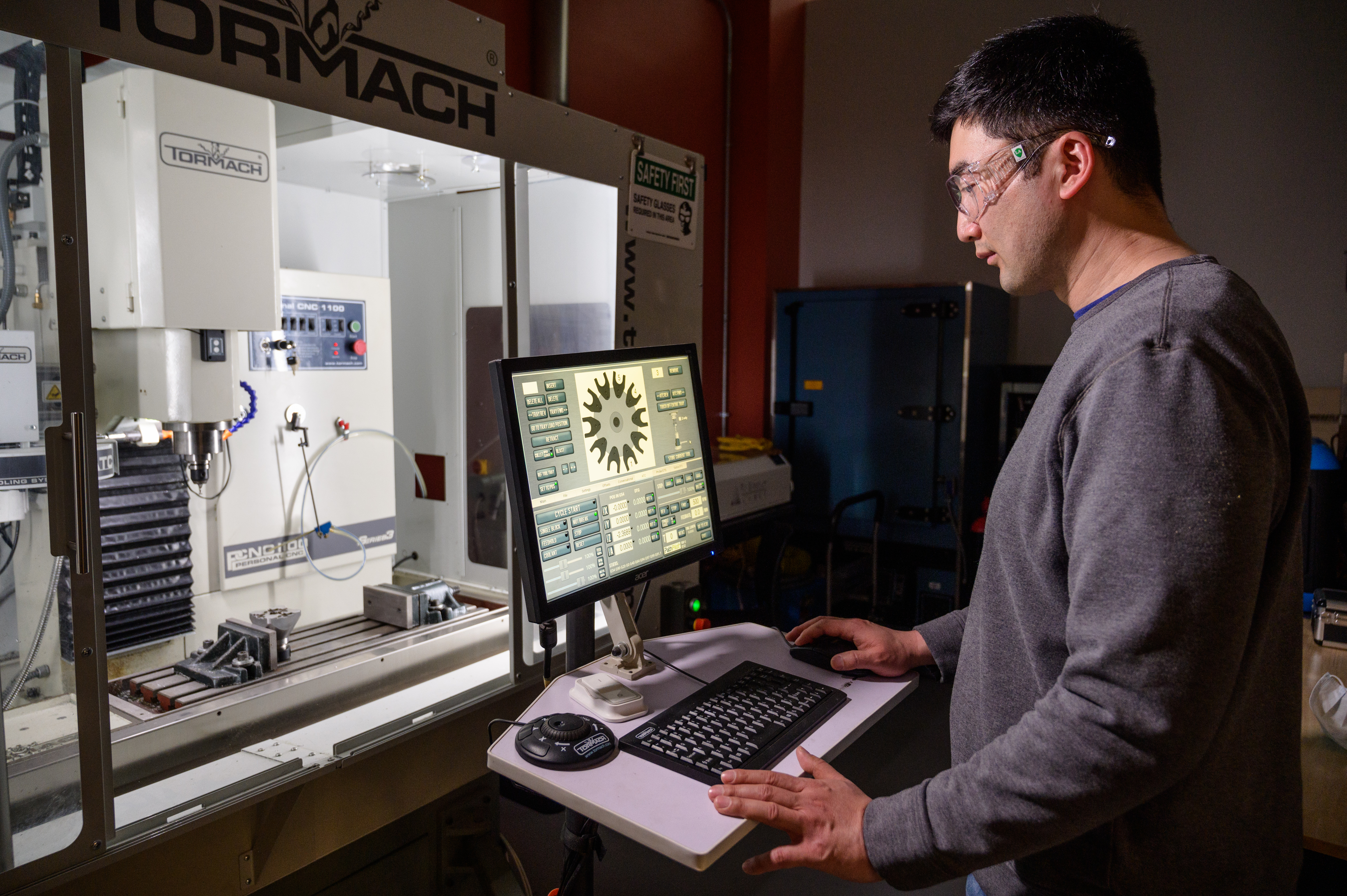 student on computer in lab