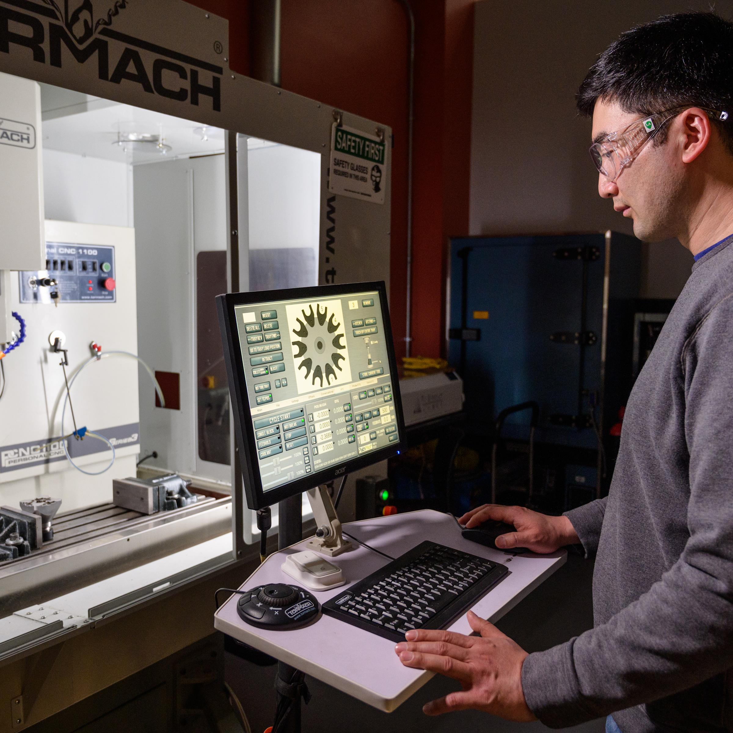 student on computer in lab