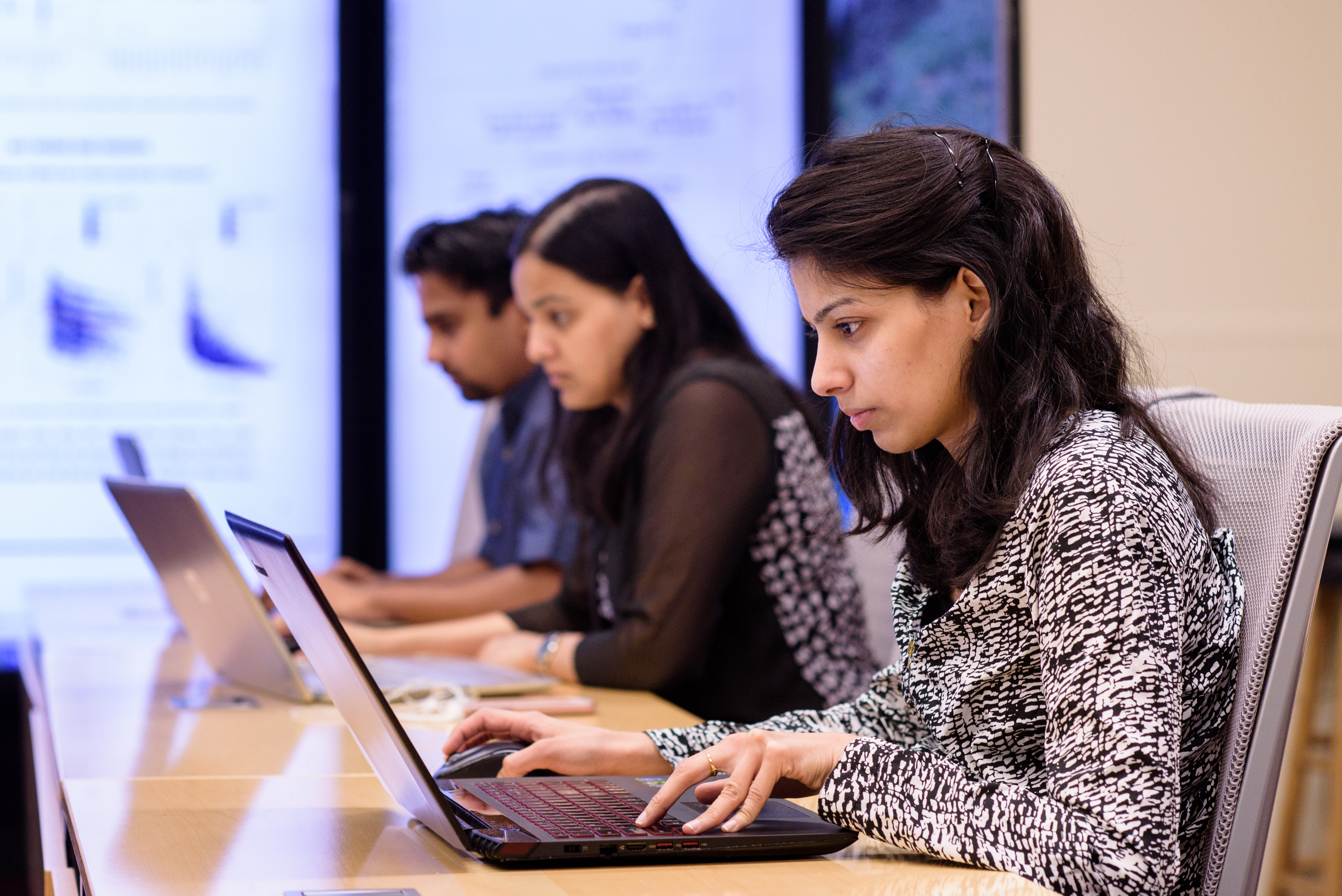 Image of individual on laptop