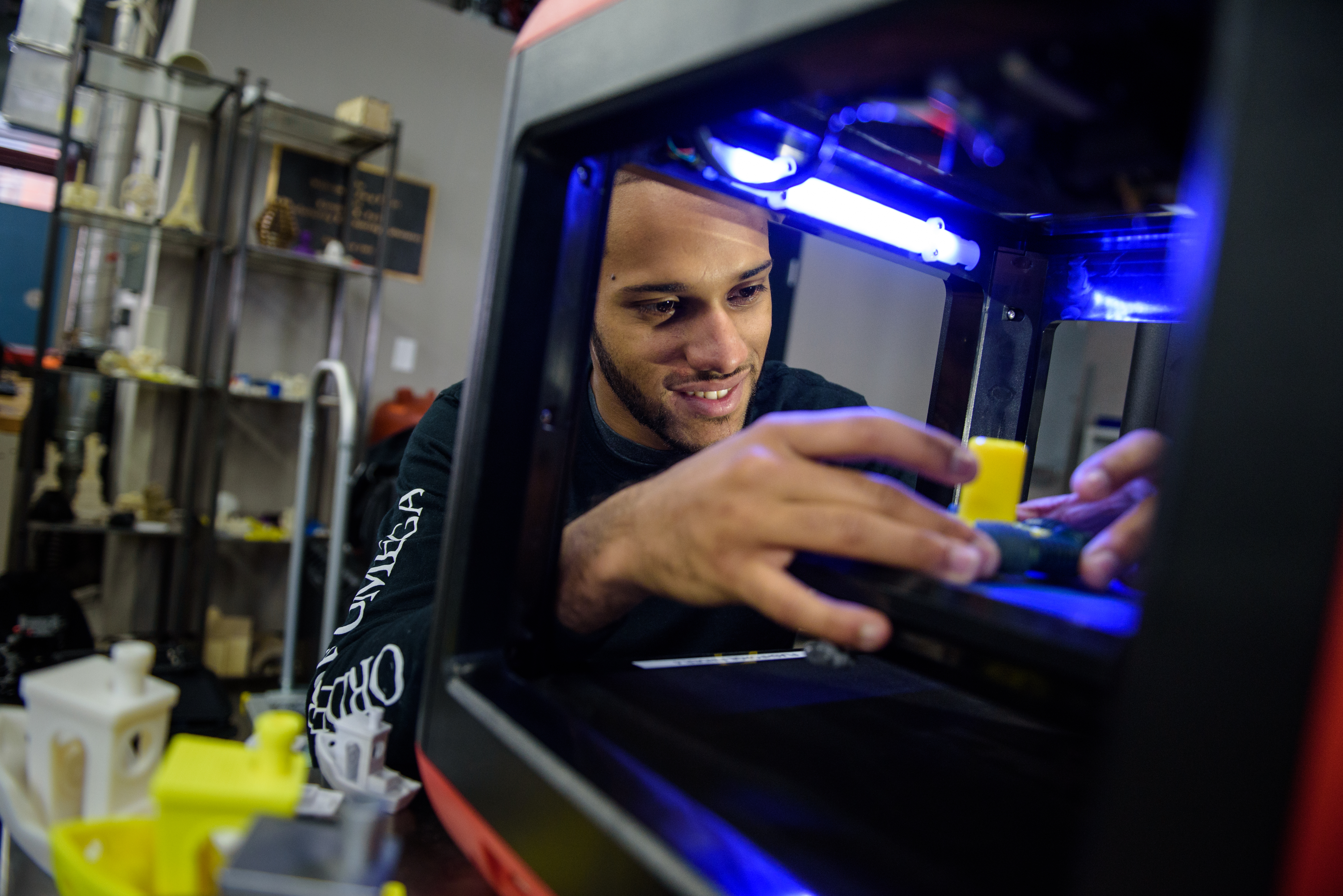 Male student working on an experiment 