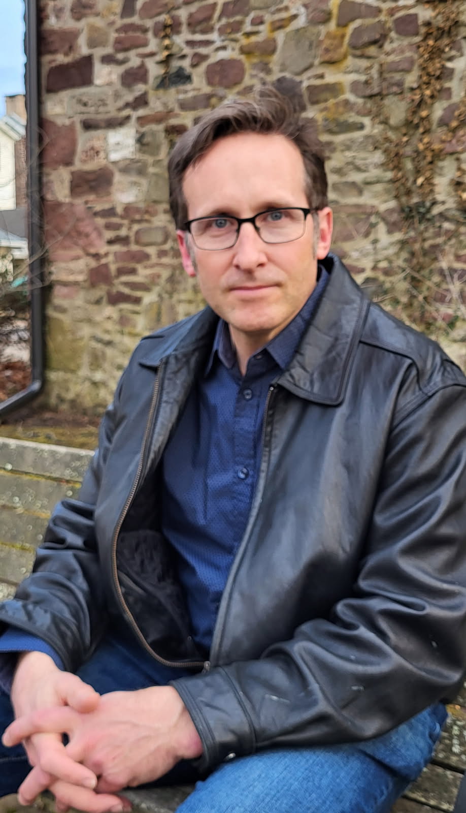 Chuck Schaeffer headshot outside in a park