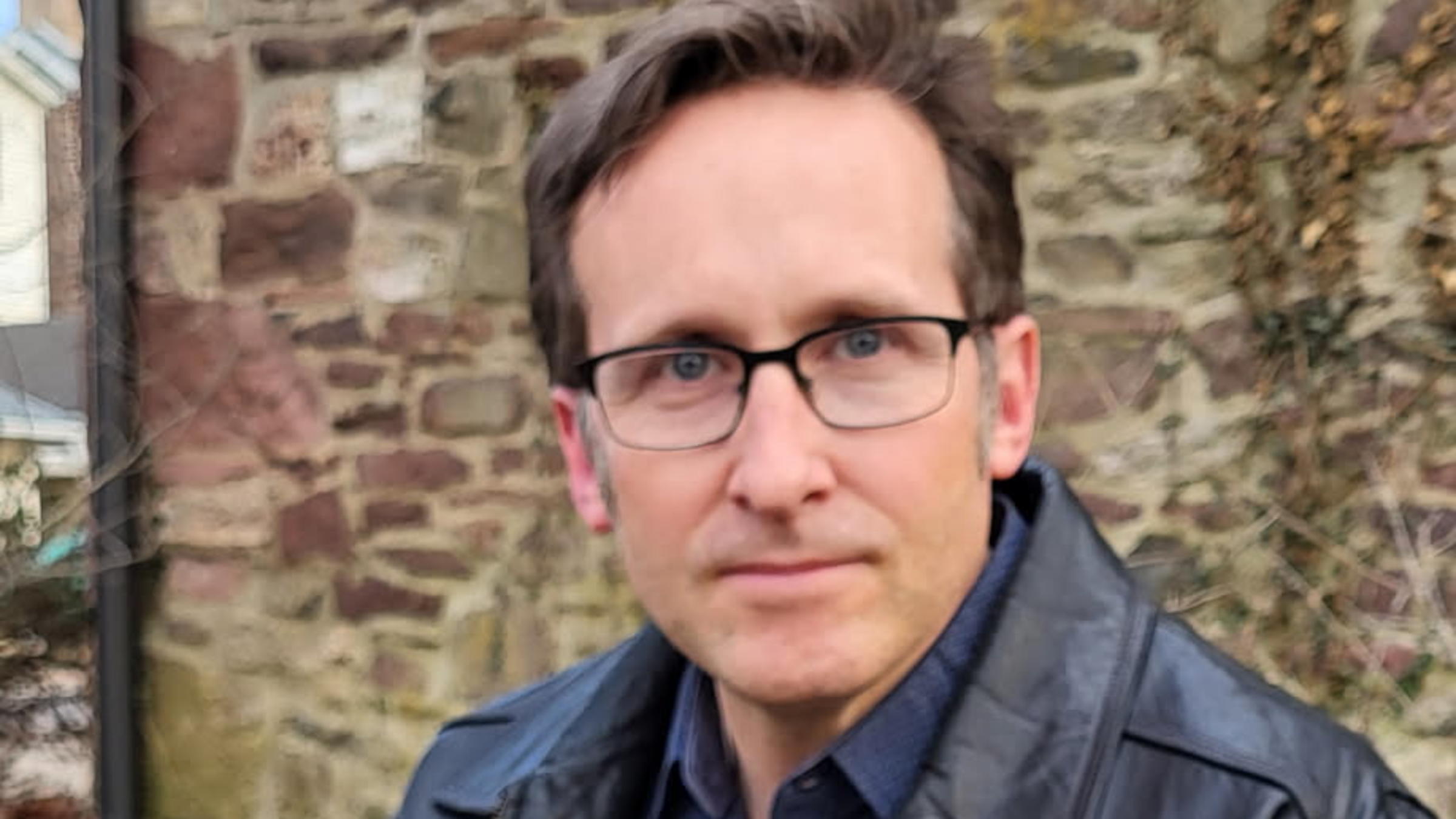 Chuck Schaeffer headshot outside in a park