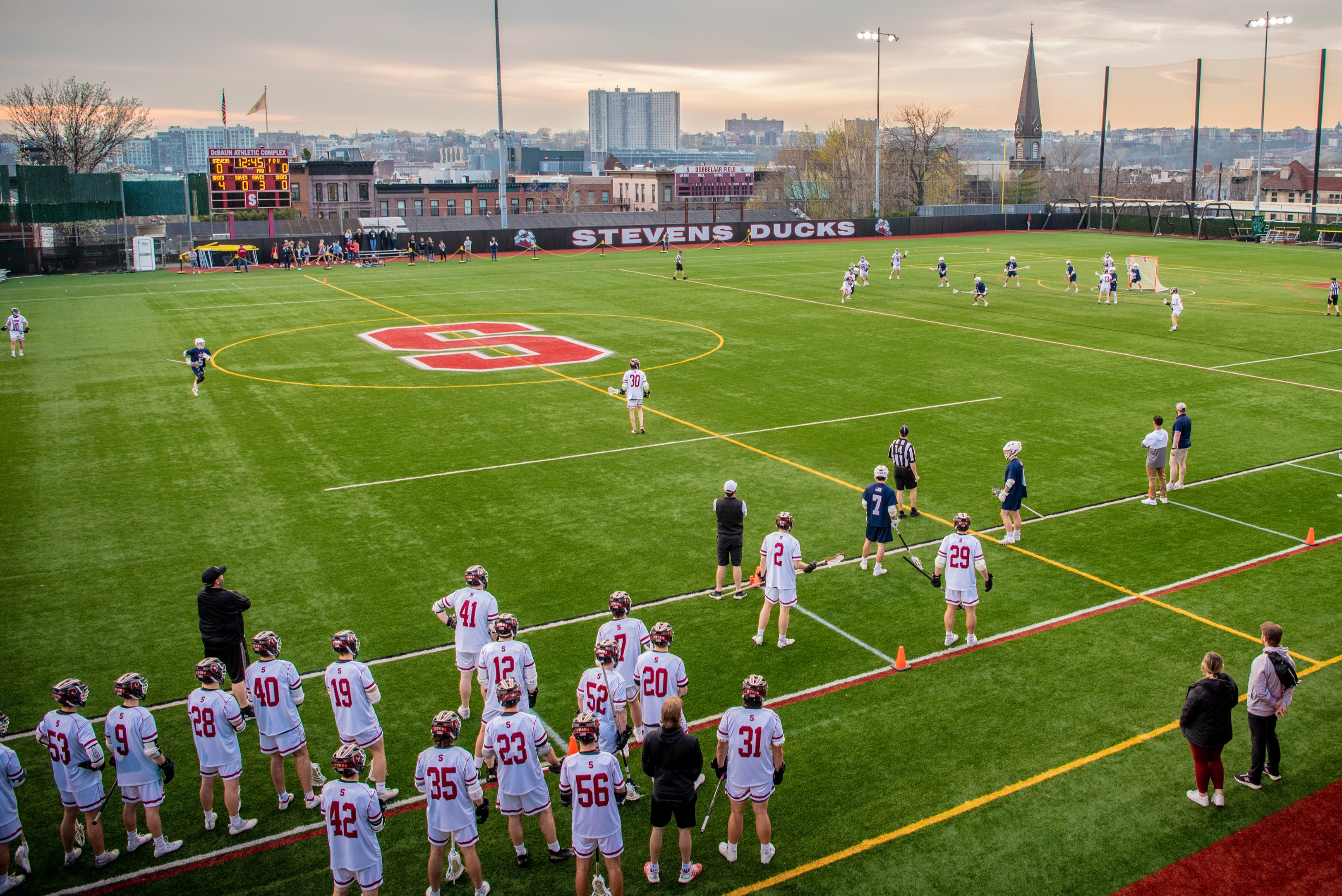 Stevens men's  lacrosse team on the field.