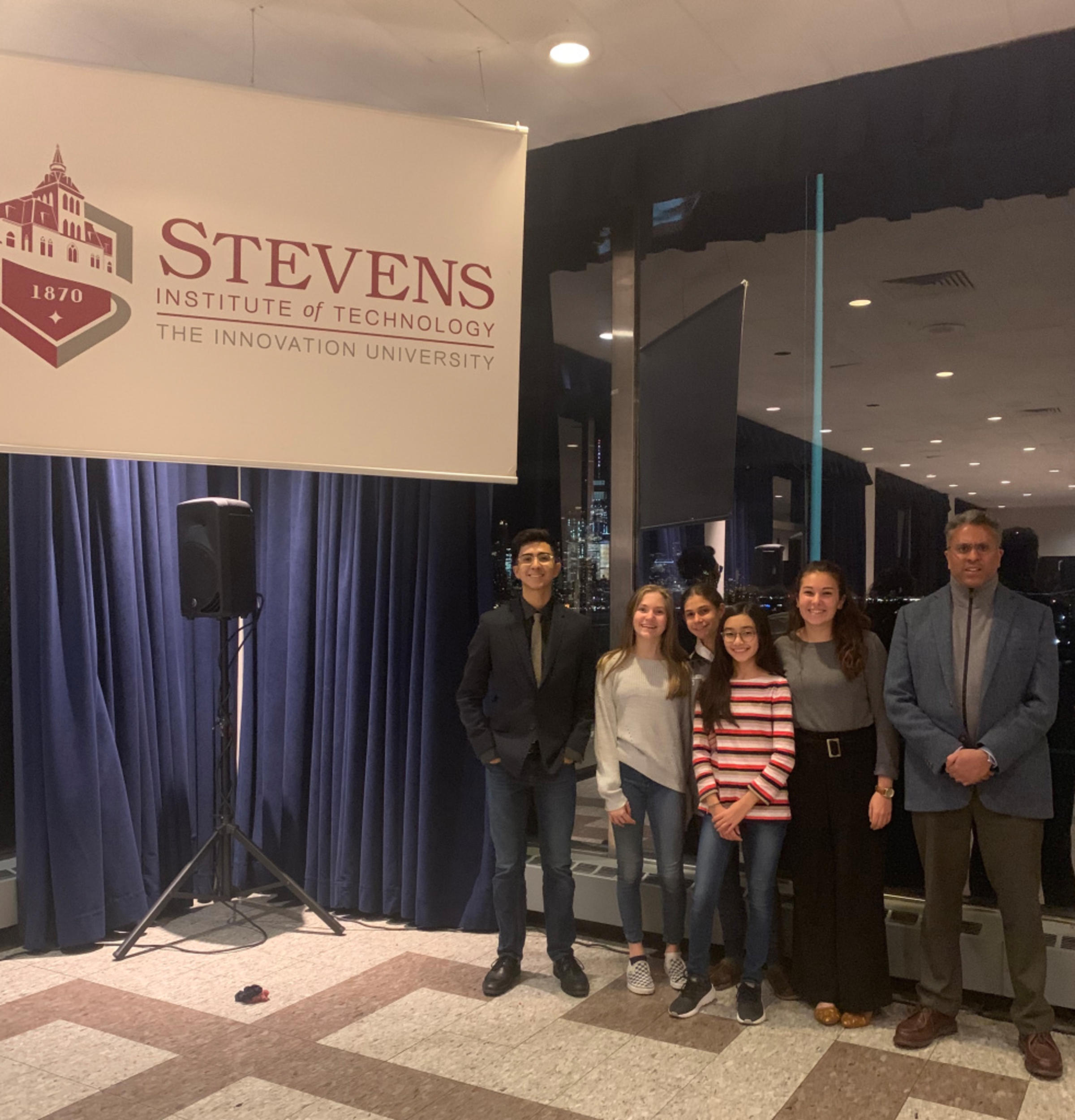 Photo of Gili and high school students