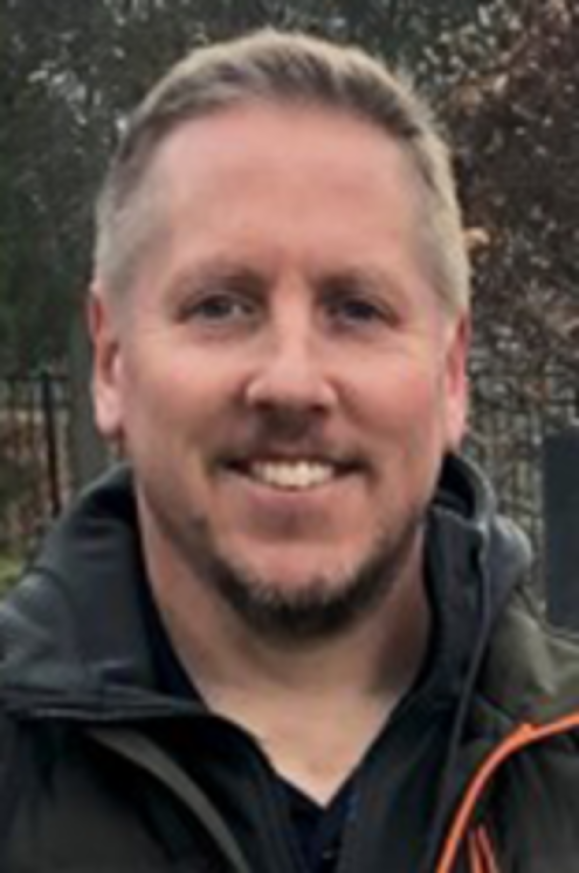 Headshot of Kevin Storms.