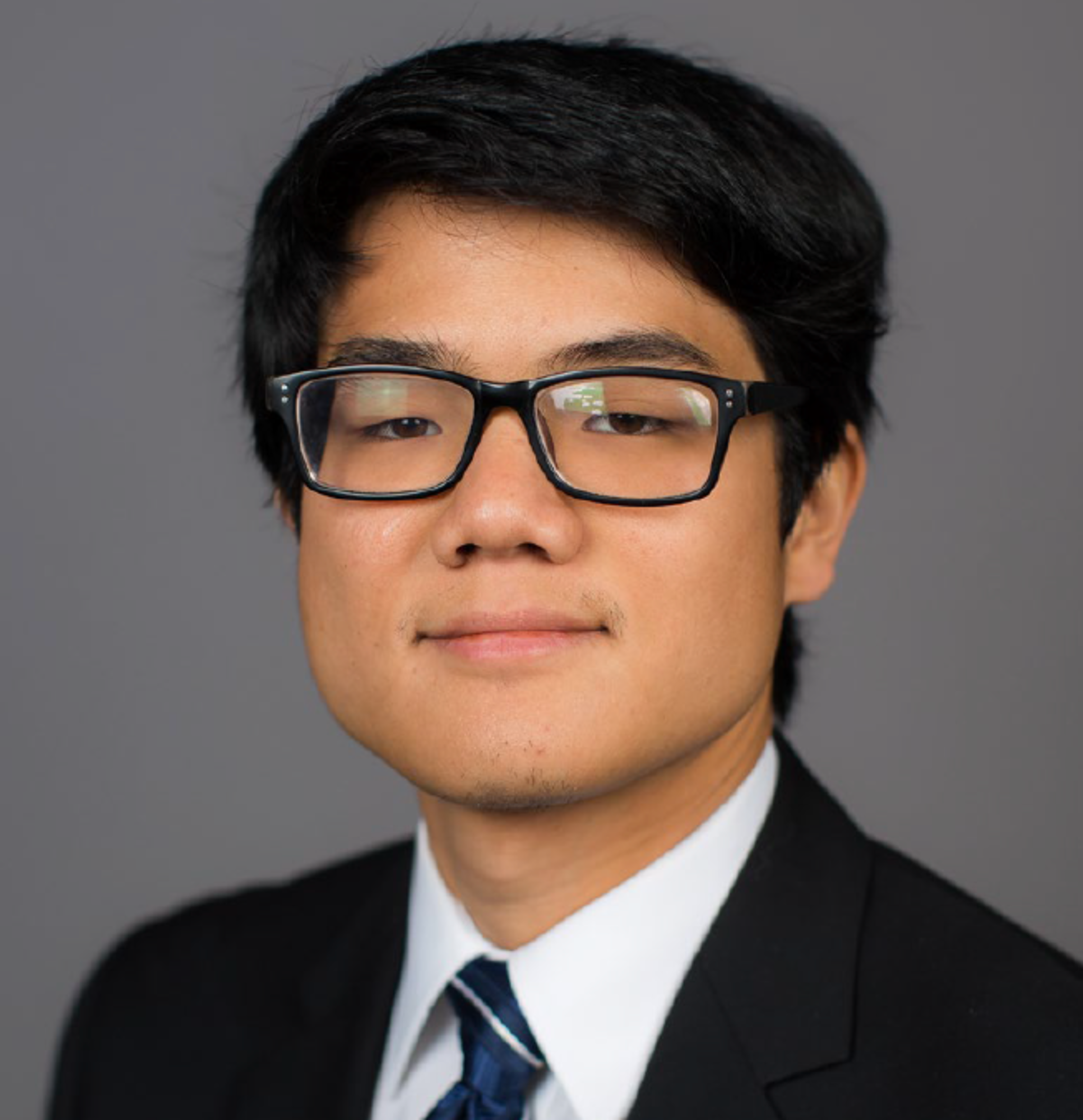 Professional headshot of Christopher Sugino
