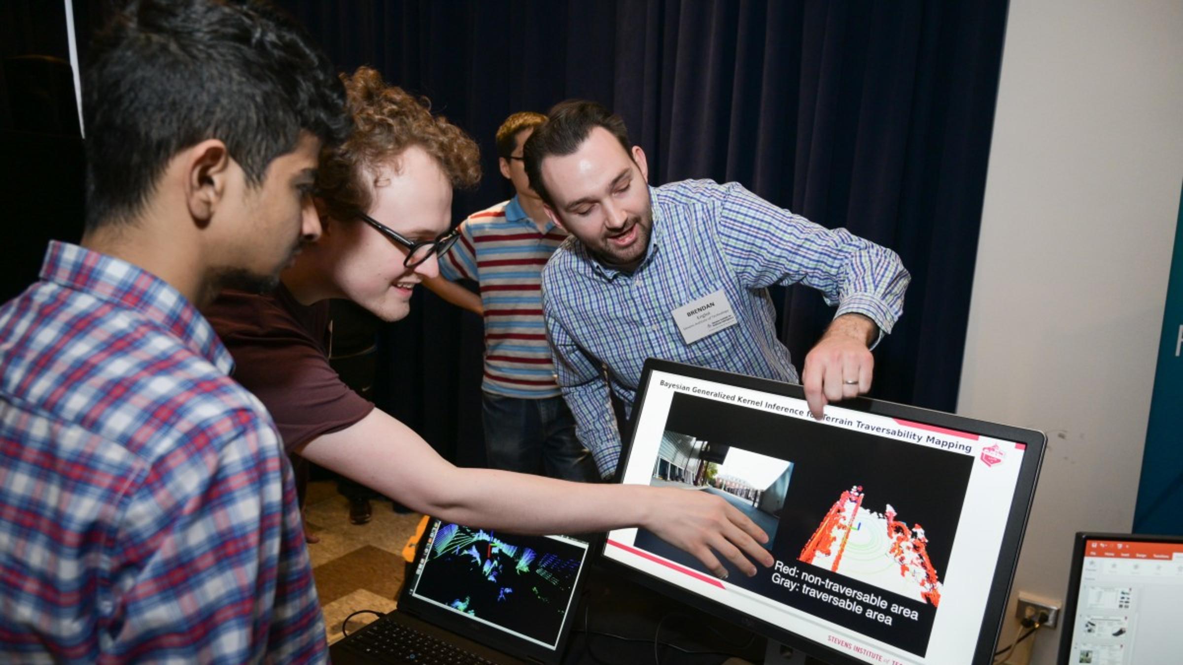 Brendan Englot demonstrating an AI-driven underwater mapping robotics system