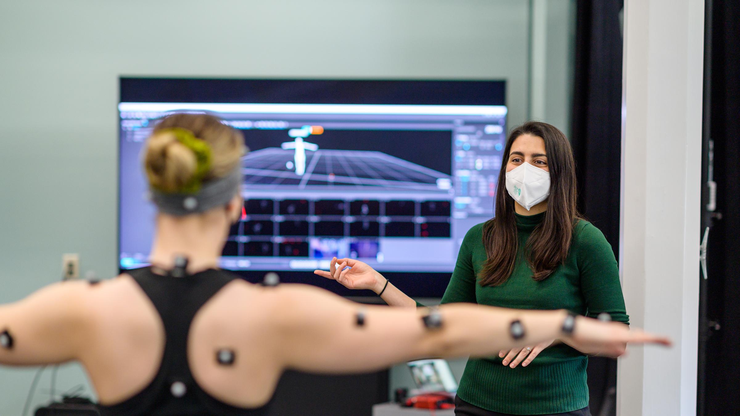 In the Musculoskeletal Control and Dynamics Lab, Stevens professor Antonia Zaferiou works with a dancer to determine how sound-based biofeedback can improve balance and agility.