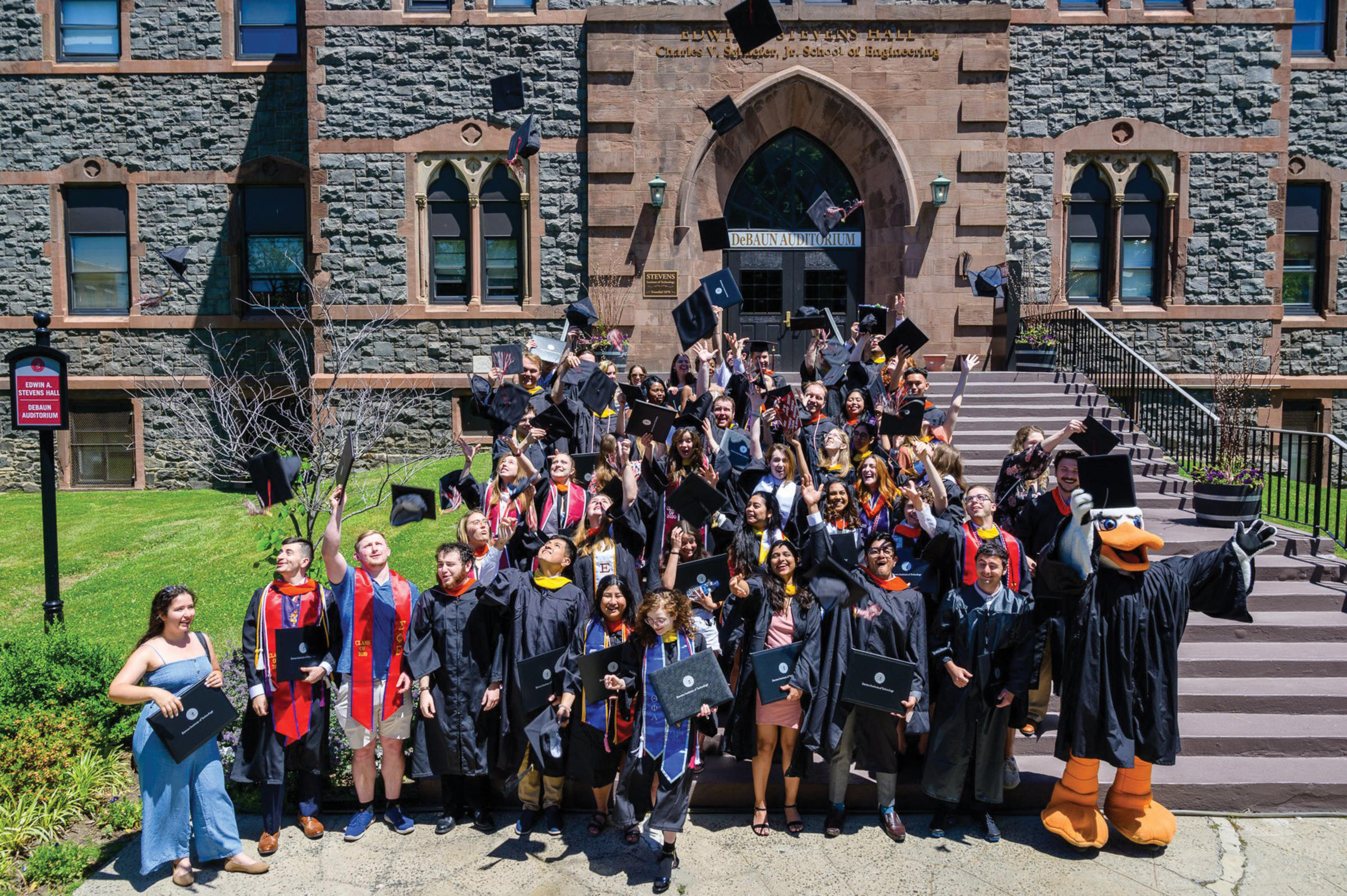 Group of Alumni in front of EAS building.