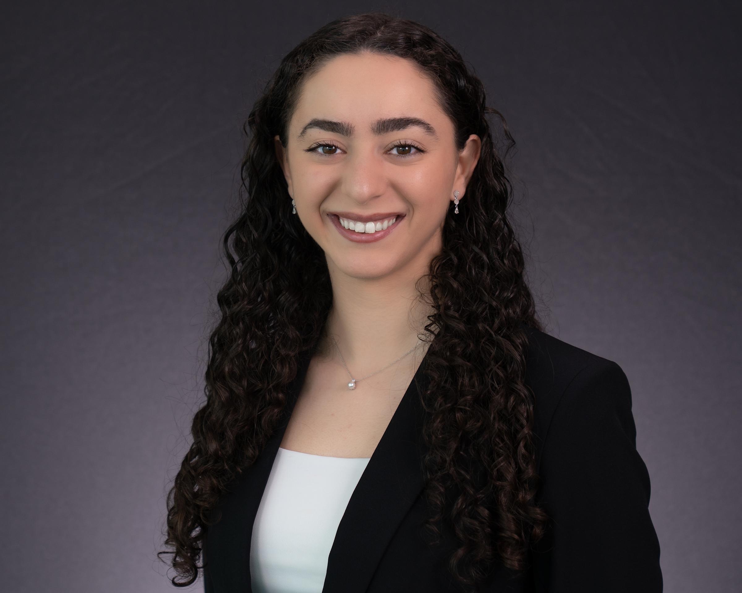 Headshot of Giovanna Notaro dressed in professional attire.