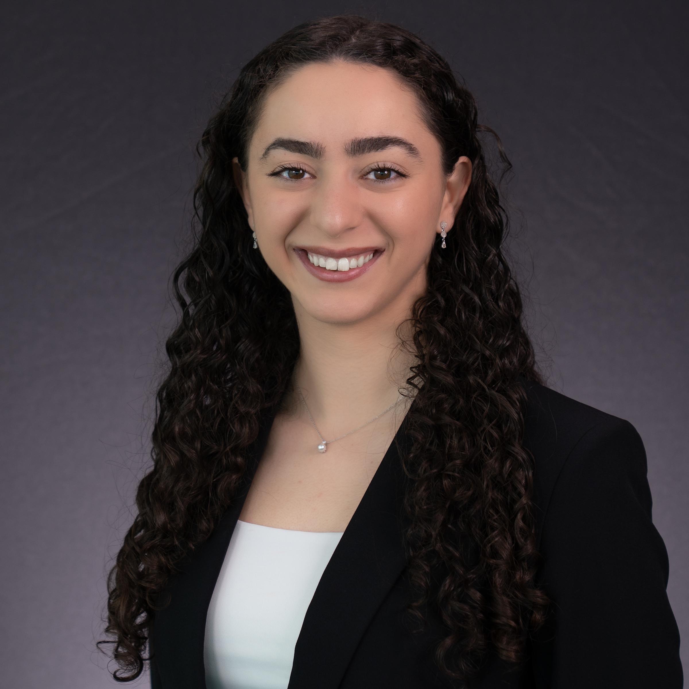 Headshot of Giovanna Notaro dressed in professional attire.