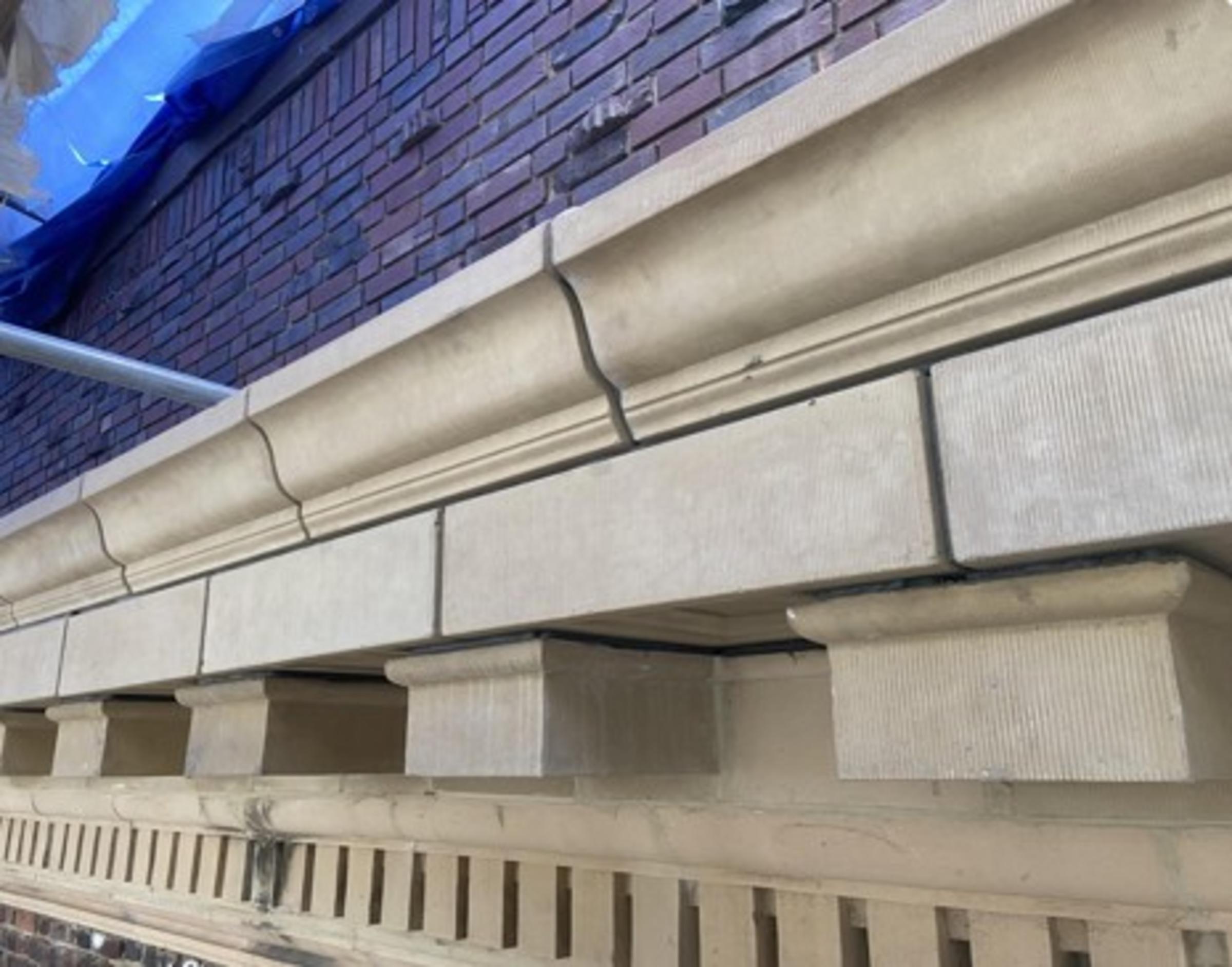 Cornice reconstruction at west and south elevations, after restoration