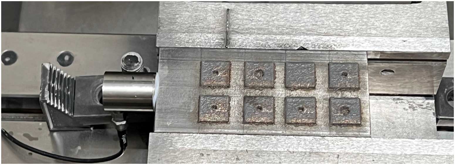 Optomec LDED machine chamber with an integrated AE sensor. 